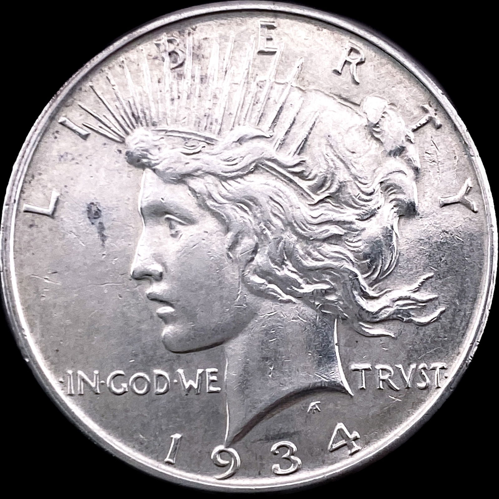 1934 Silver Peace Dollar CLOSELY UNCIRCULATED (1 of 2)