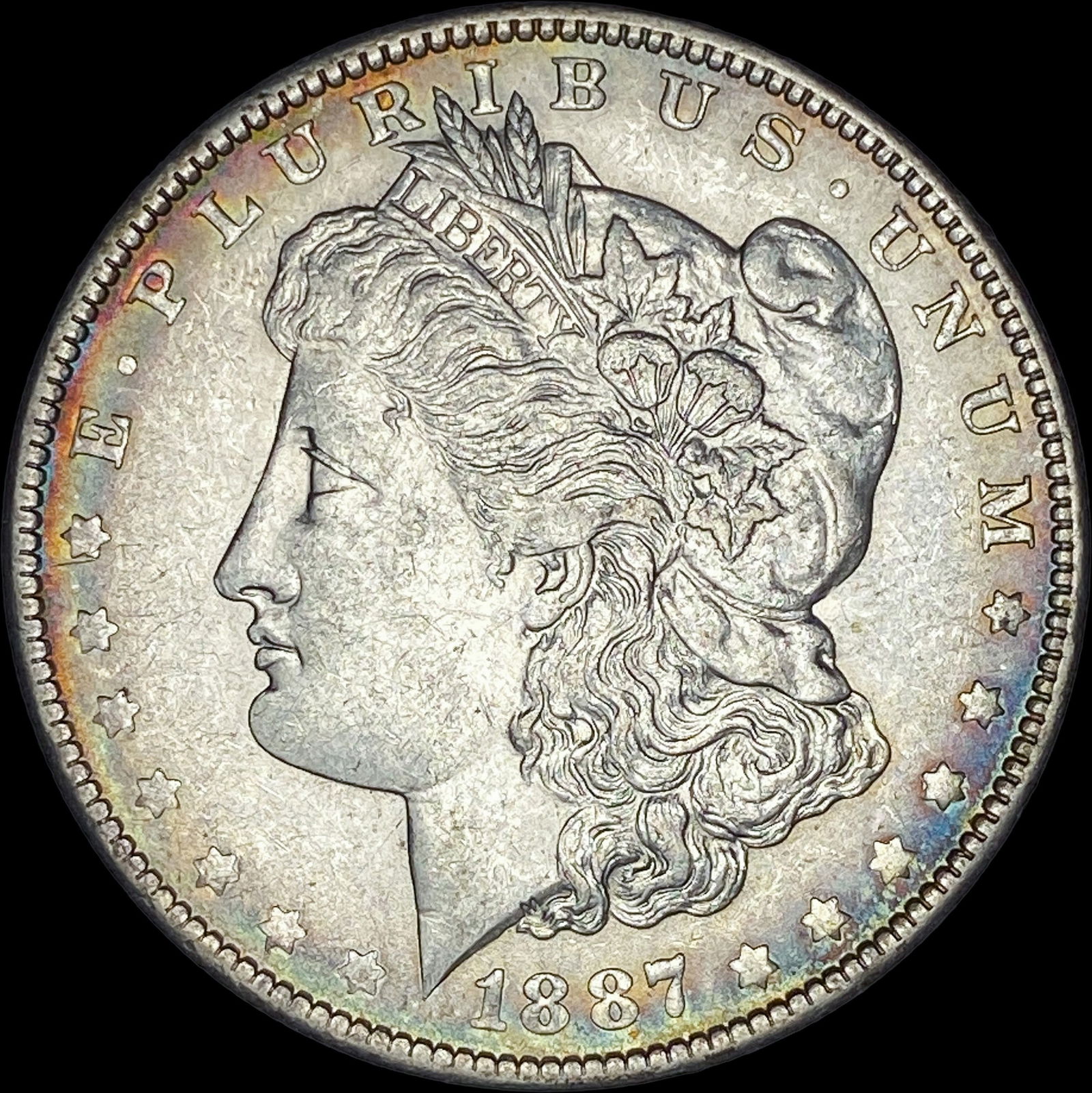 1887-O Morgan Silver Dollar NEARLY UNCIRCULATED (1 of 2)
