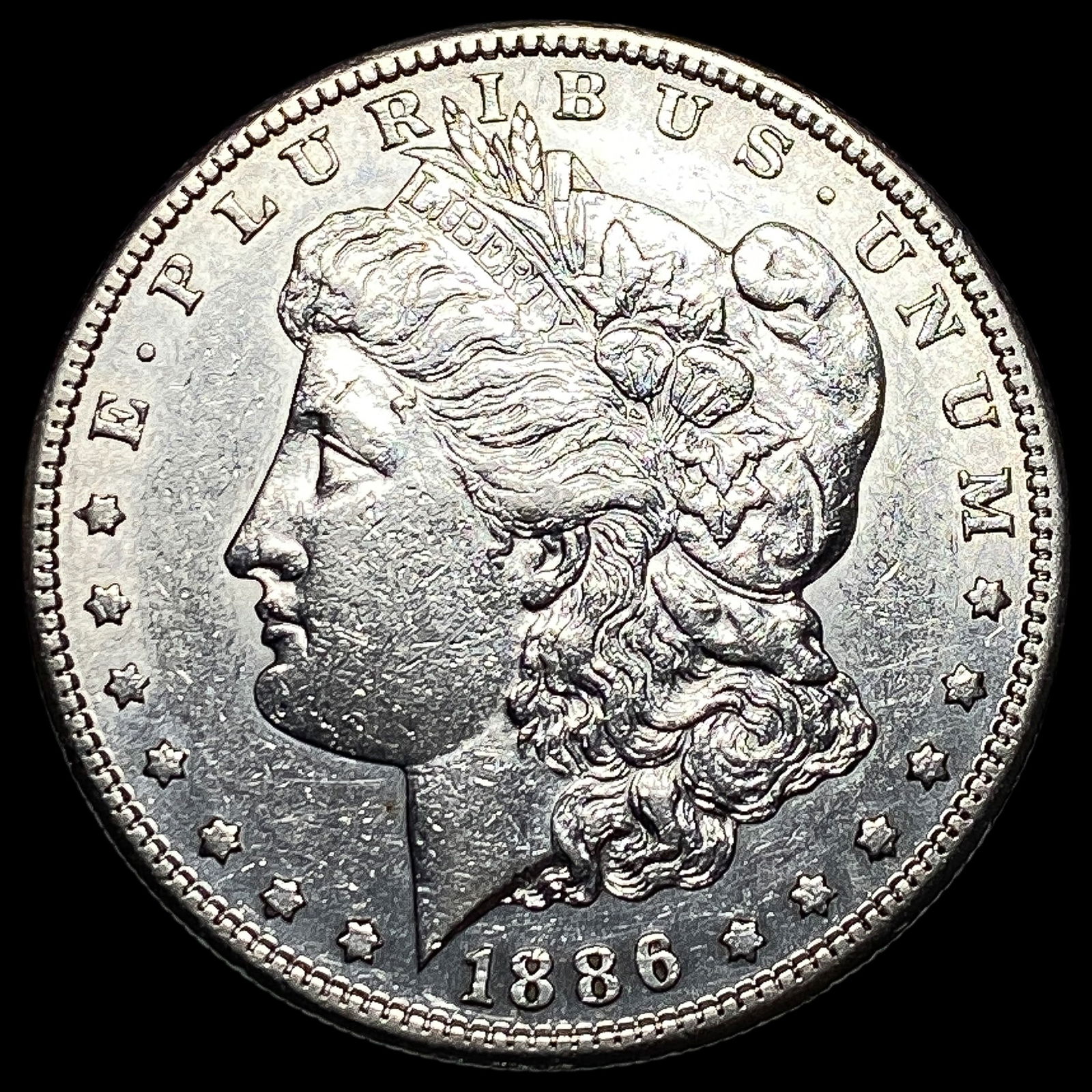 1886 Morgan Silver Dollar CLOSELY UNCIRCULATED (1 of 2)