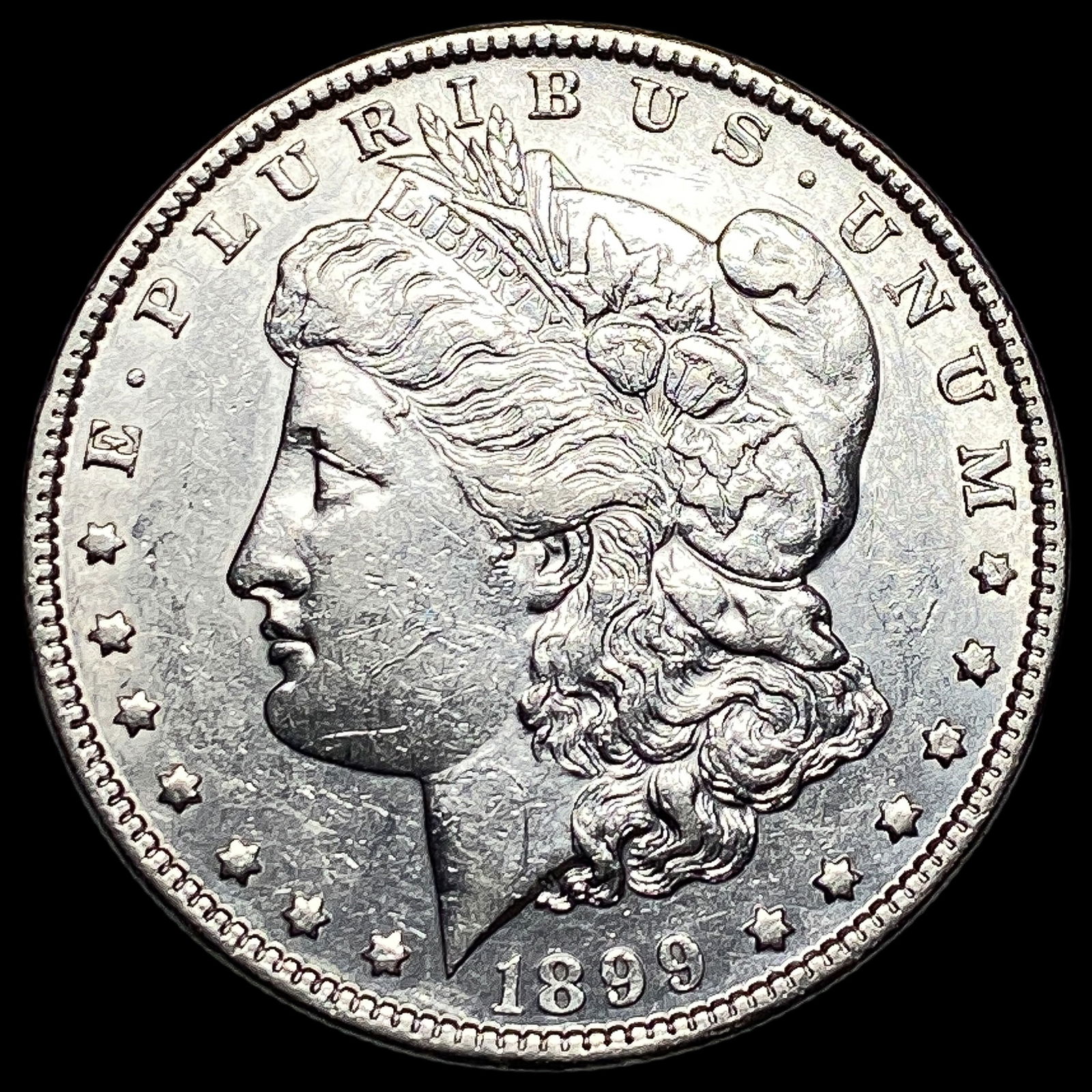 1899 Morgan Silver Dollar CLOSELY UNCIRCULATED (1 of 2)