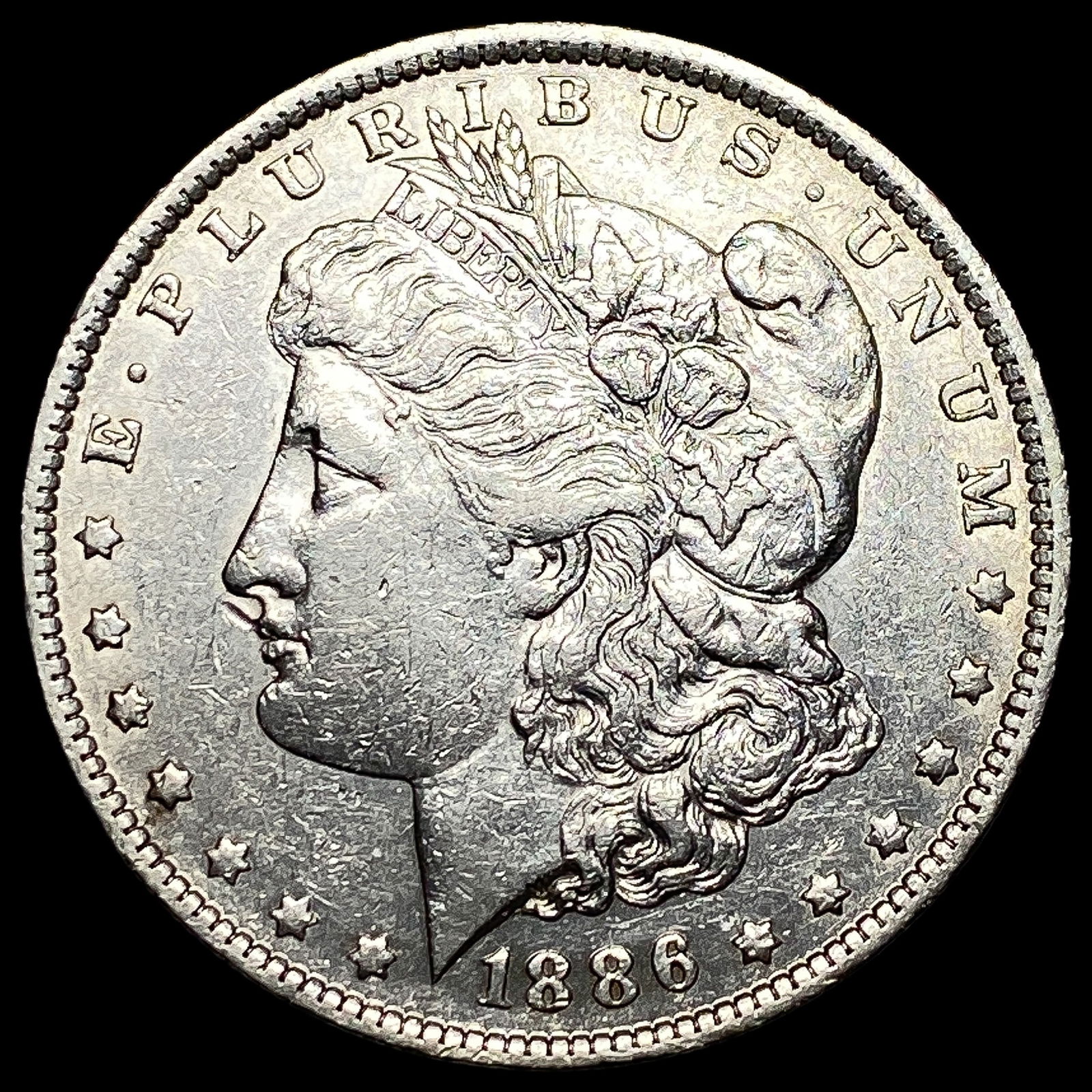 1886-O Silver Morgan Dollar CLOSELY UNCIRCULATED (1 of 2)
