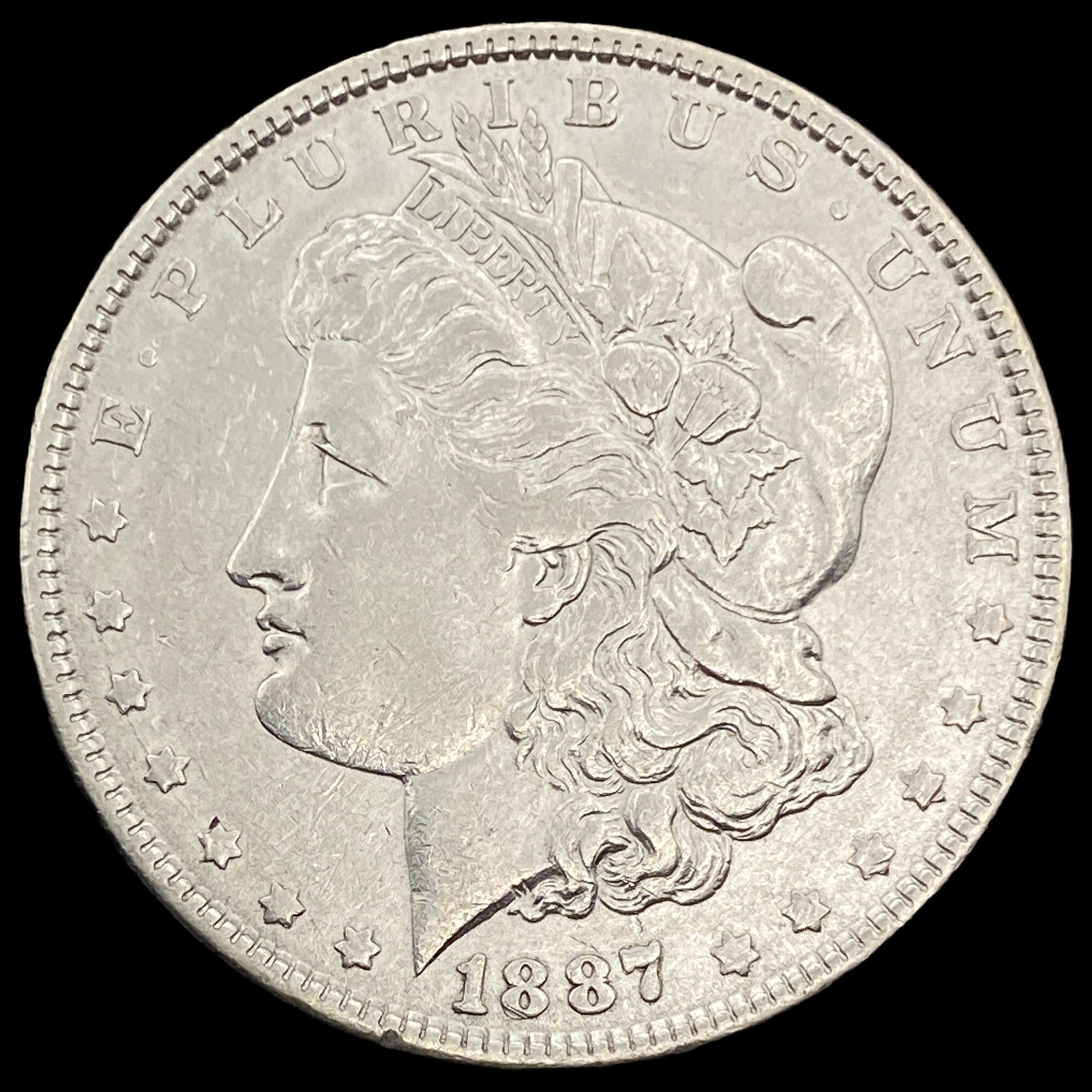 1887 Silver Morgan Dollar CLOSELY UNCIRCULATED: 1887 Silver Morgan Dollar CLOSELY UNCIRCULATED