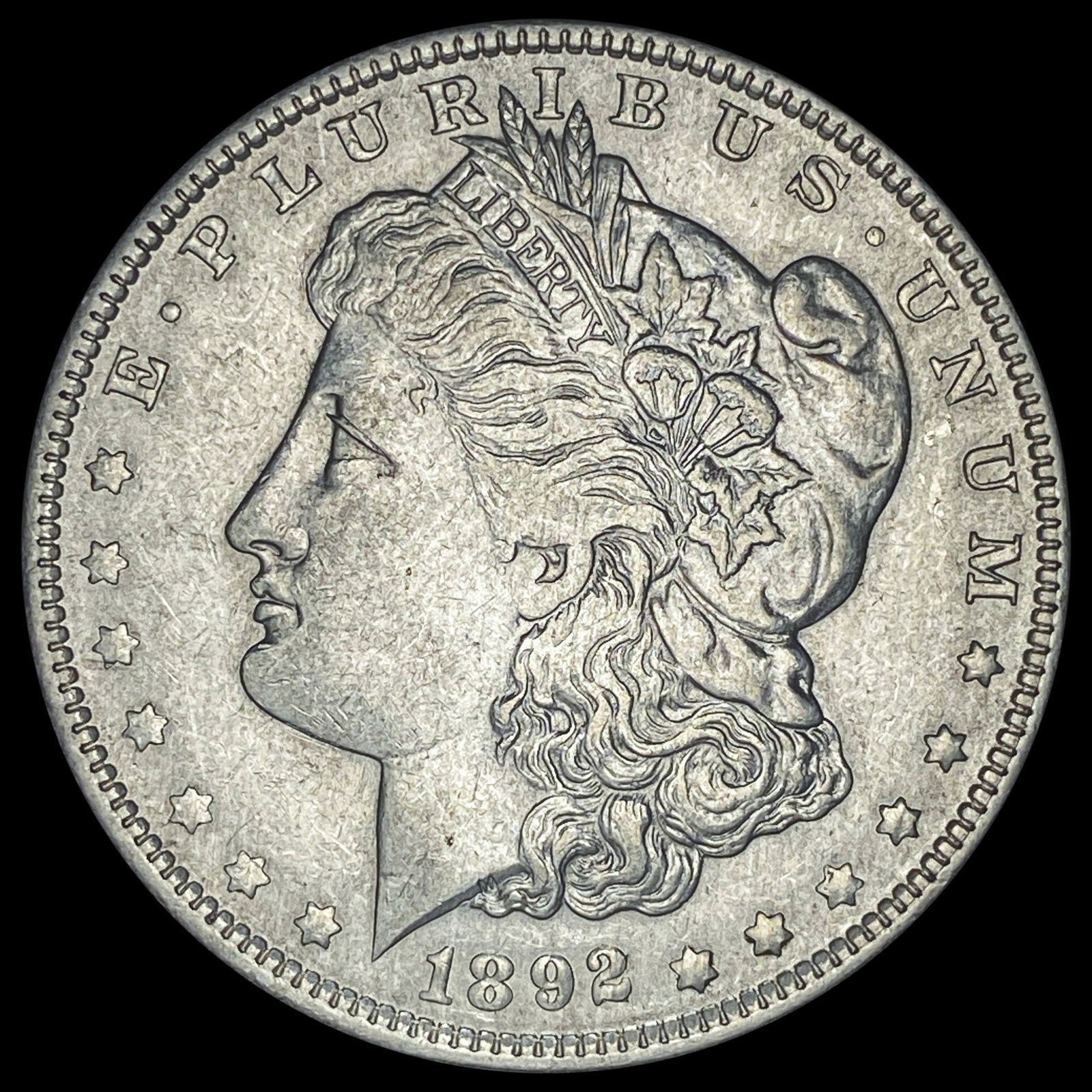 1892-O Silver Morgan Dollar CLOSELY UNCIRCULATED (1 of 2)
