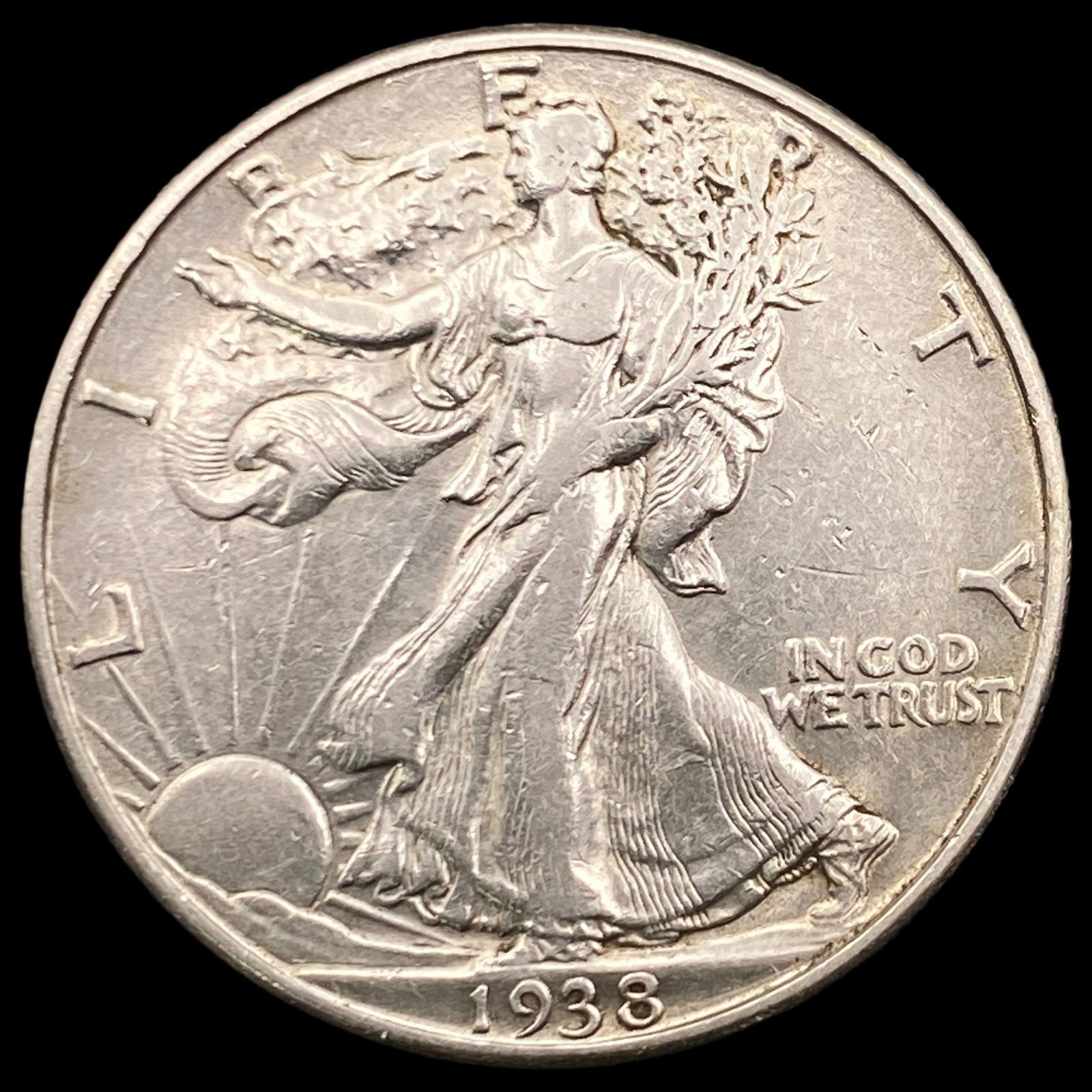 1938-D Walking Liberty Half Dollar NEARLY UNCIRCULATED (1 of 2)