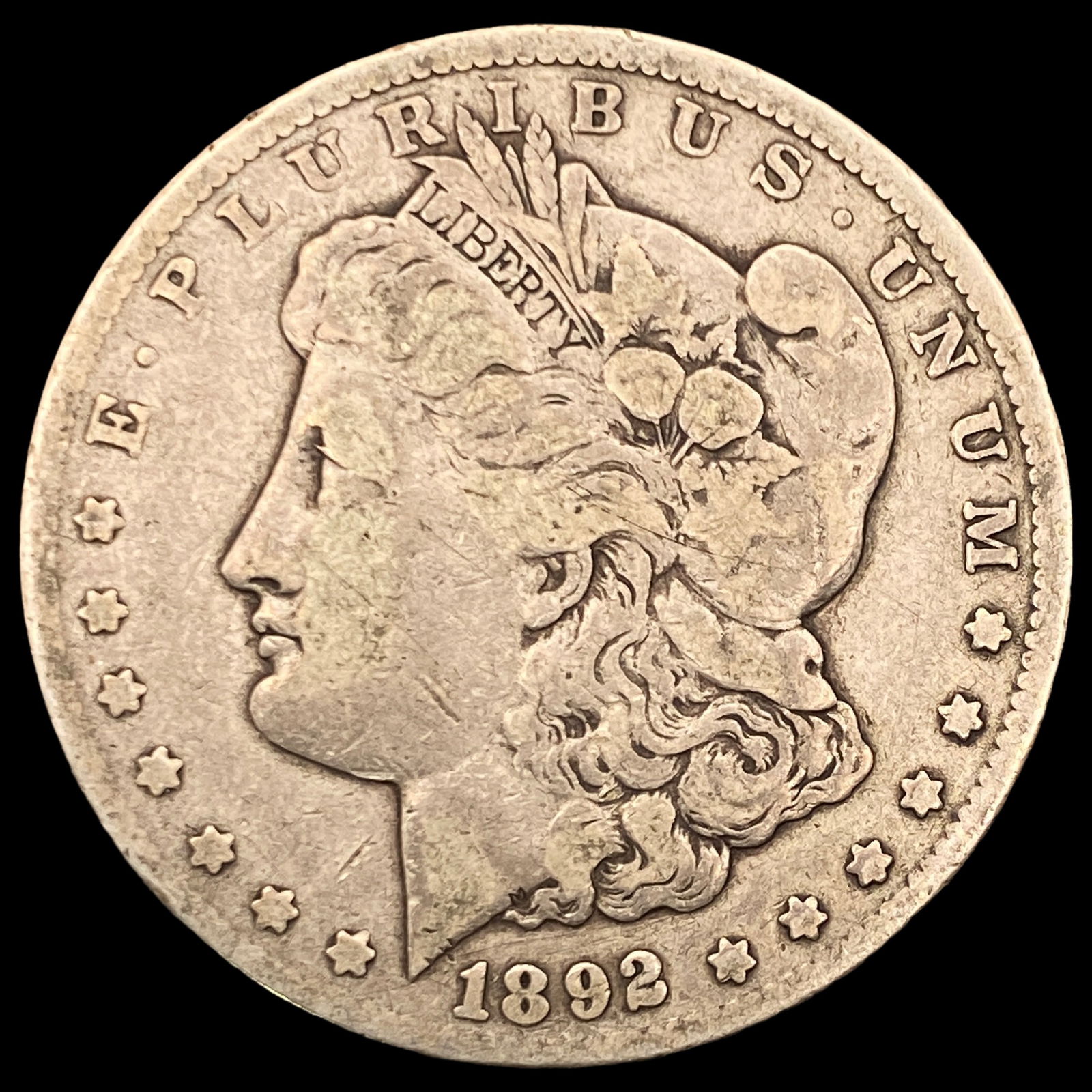 1892-CC Silver Morgan Dollar ABOUT UNCIRCULATED: 1892-CC Silver Morgan Dollar ABOUT UNCIRCULATED