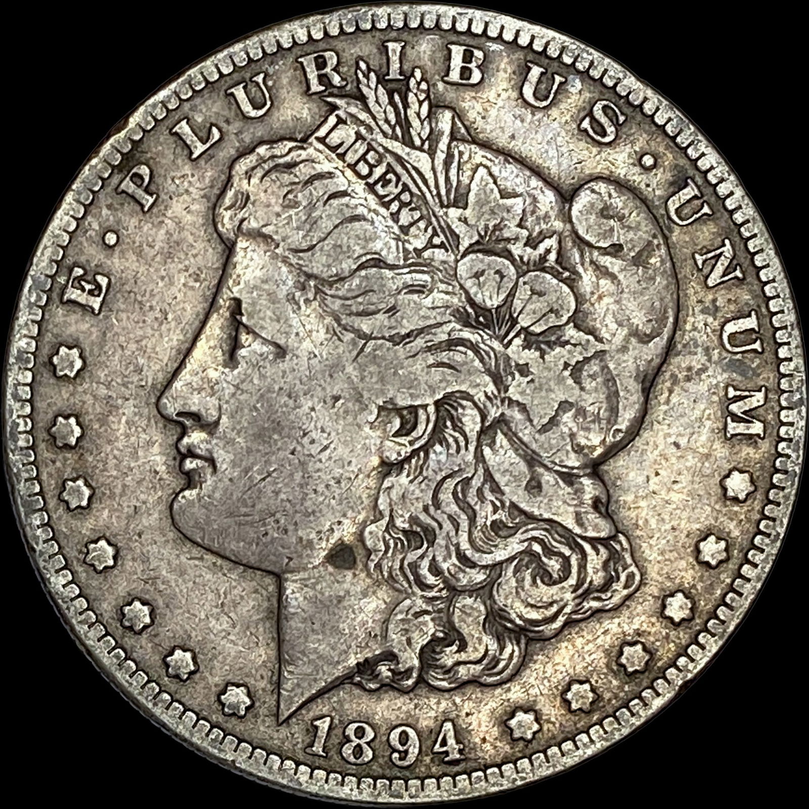 1894-S Silver Morgan Dollar ABOUT UNCIRCULATED: 1894-S Silver Morgan Dollar ABOUT UNCIRCULATED