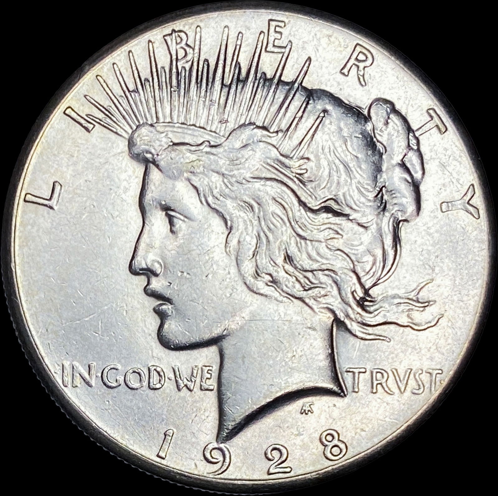 1928 Silver Peace Dollar CLOSELY UNCIRCULATED (1 of 2)