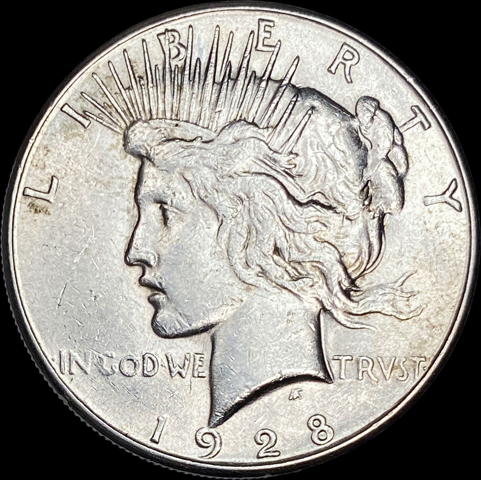 1928 Silver Peace Dollar CLOSELY UNCIRCULATED (1 of 2)