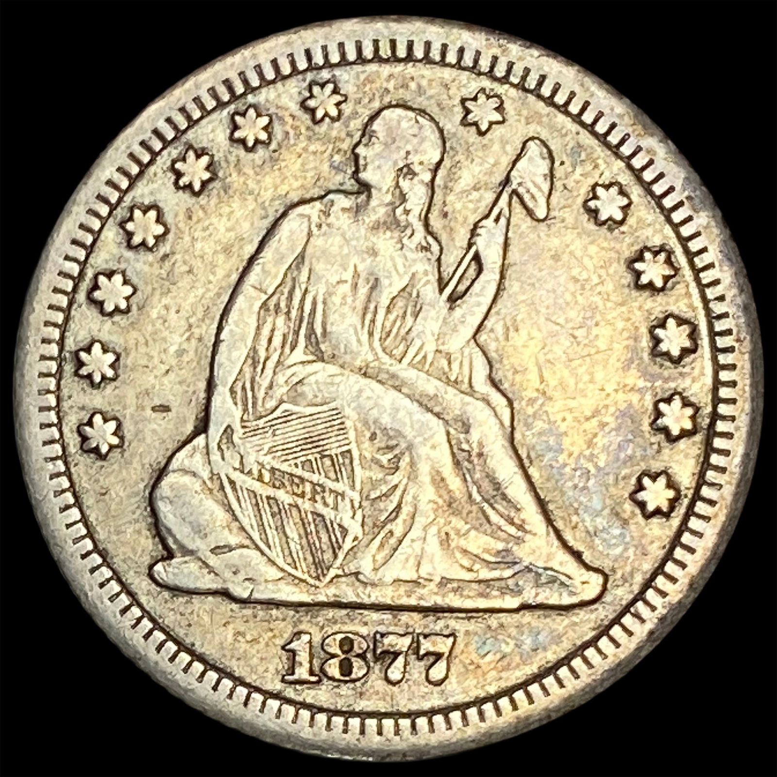 1877-CC Silver Seated Liberty Quarter NEARLY UNCIRCULATED (1 of 2)