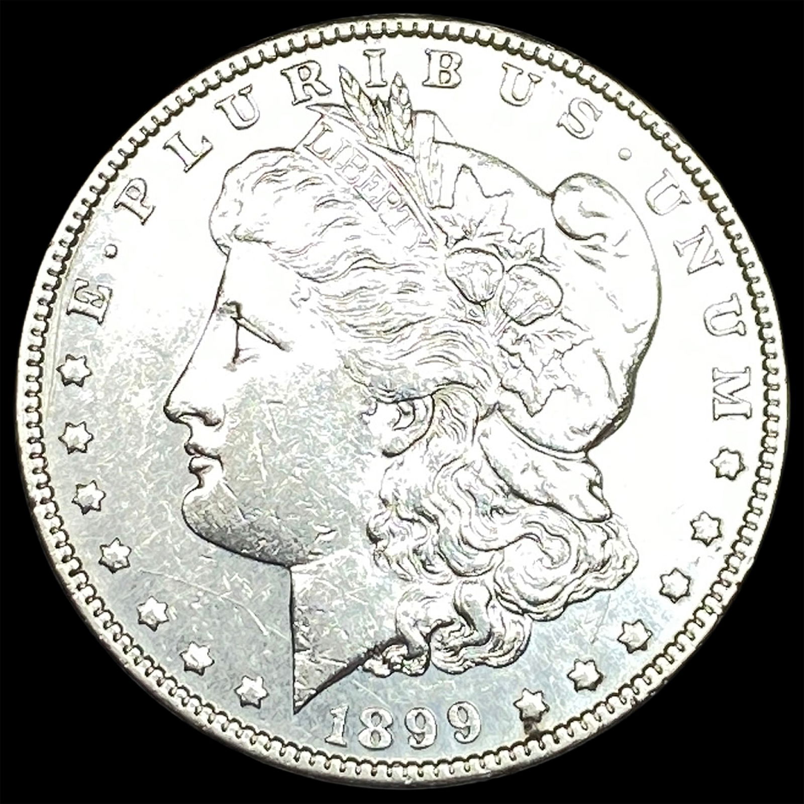 1899 Silver Morgan Dollar CLOSELY UNCIRCULATED: 1899 Silver Morgan Dollar CLOSELY UNCIRCULATED