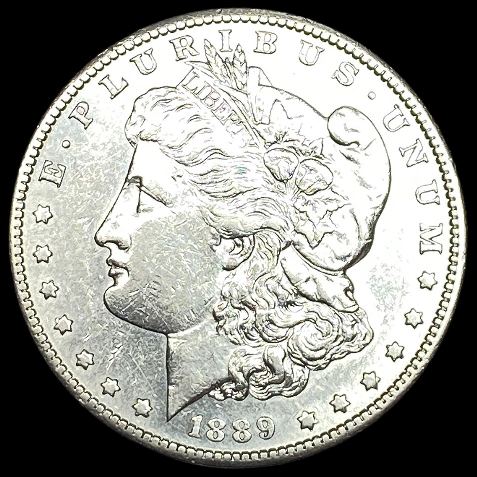 1889 Morgan Silver Dollar CLOSELY UNCIRCULATED (1 of 2)