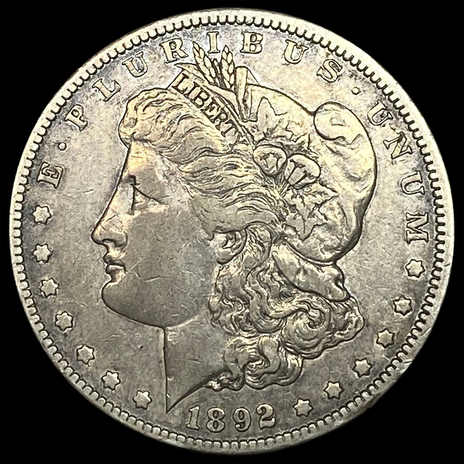 1892-CC Silver Morgan Dollar NEARLY UNCIRCULATED (1 of 2)