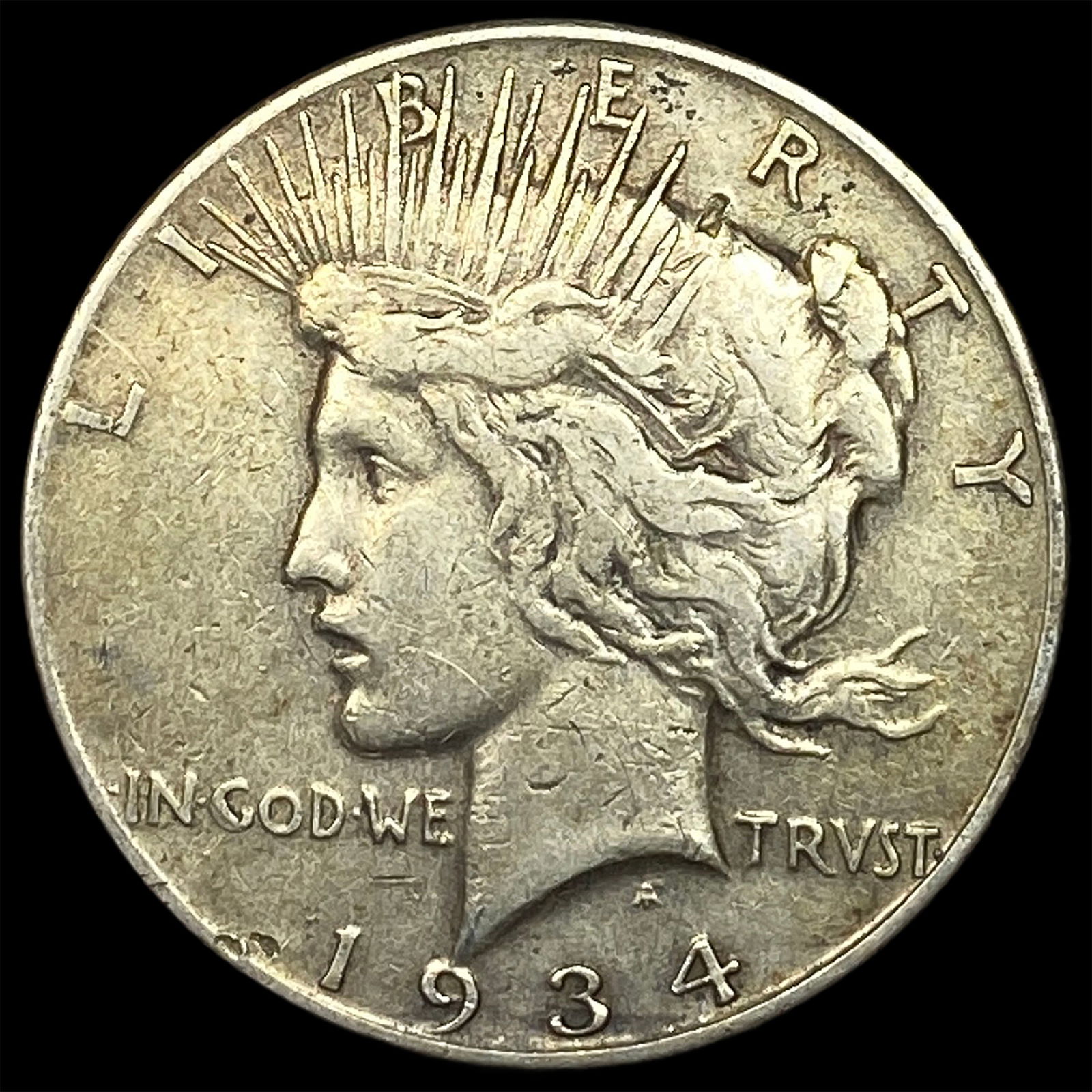1934 Peace Silver Dollar NEARLY UNCIRCULATED (1 of 2)