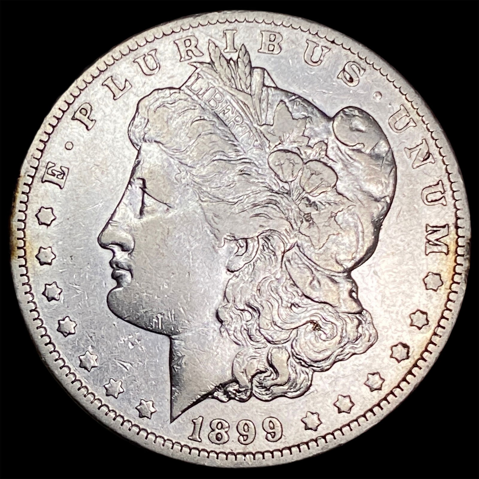 1899 Morgan Silver Dollar NEARLY UNCIRCULATED (1 of 2)