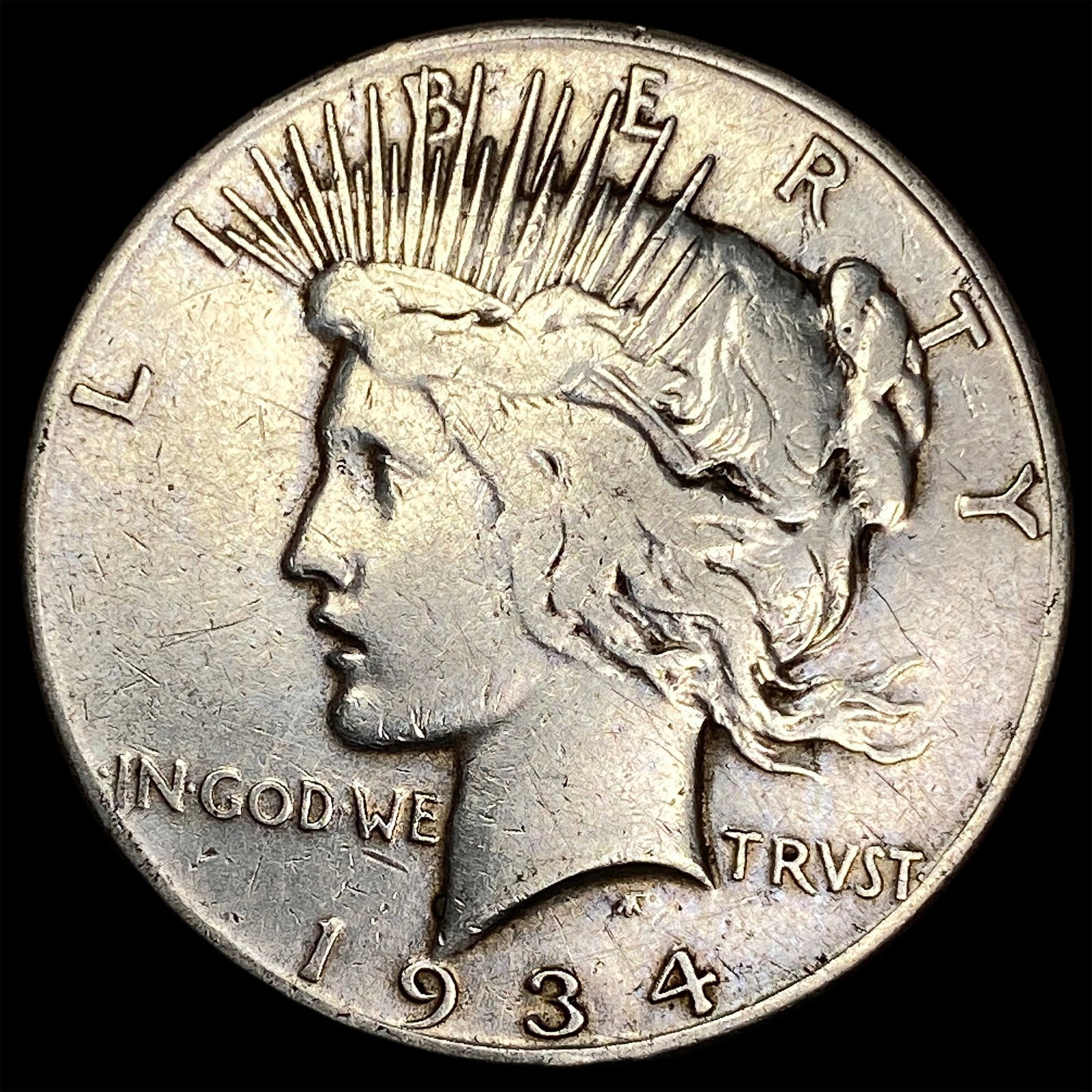 1934 Silver Peace Dollar ABOUT UNCIRCULATED (1 of 2)