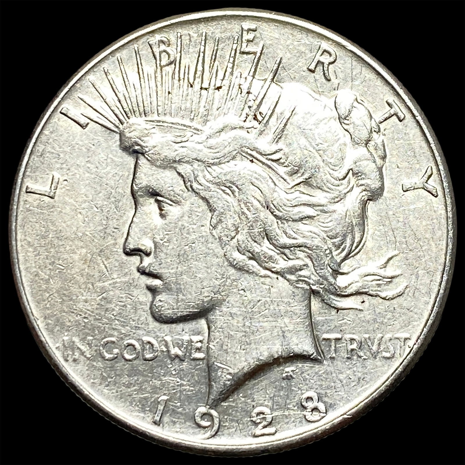 1928 Silver Peace Dollar CLOSELY UNCIRCULATED (1 of 2)