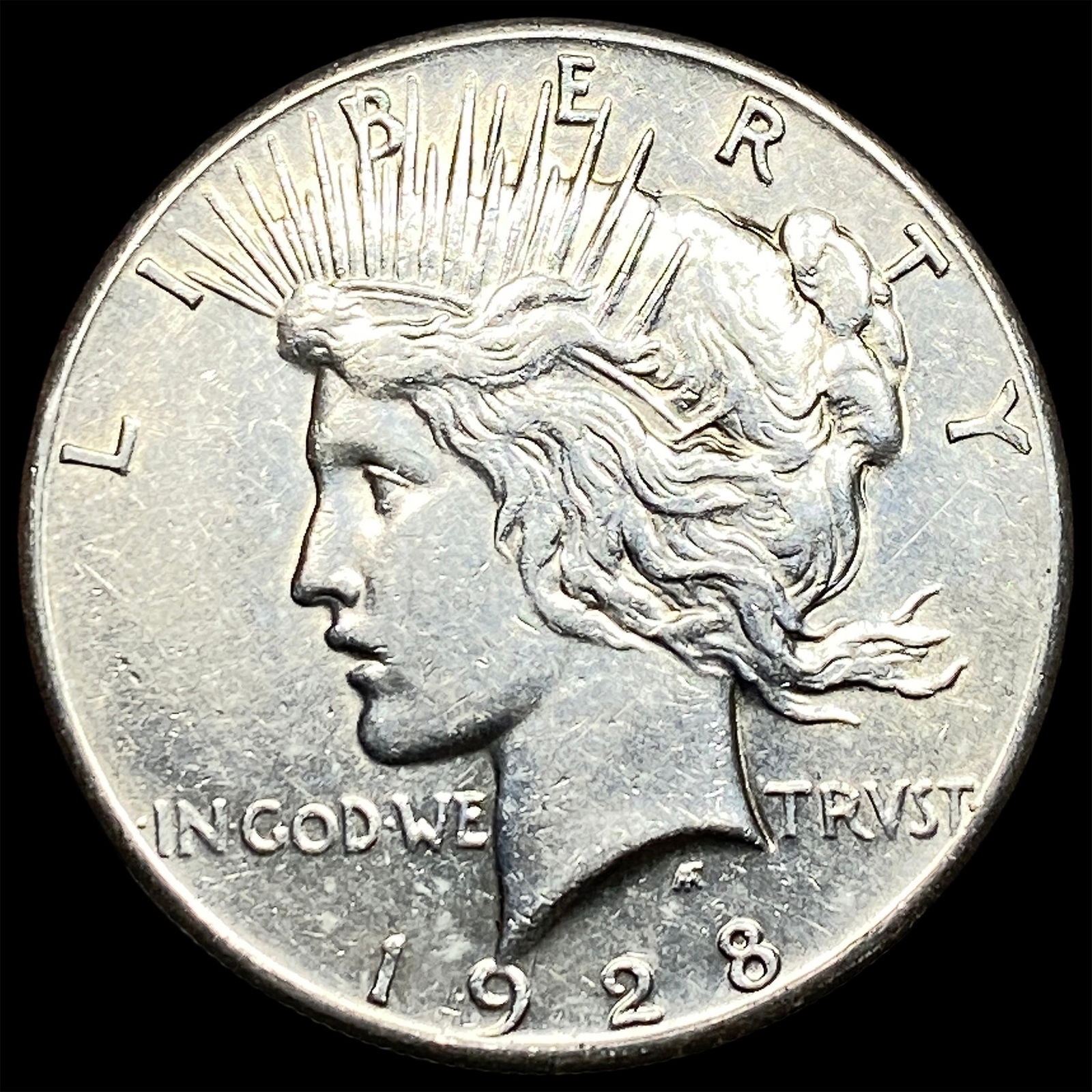 1928 Silver Peace Dollar CLOSELY UNCIRCULATED (1 of 2)