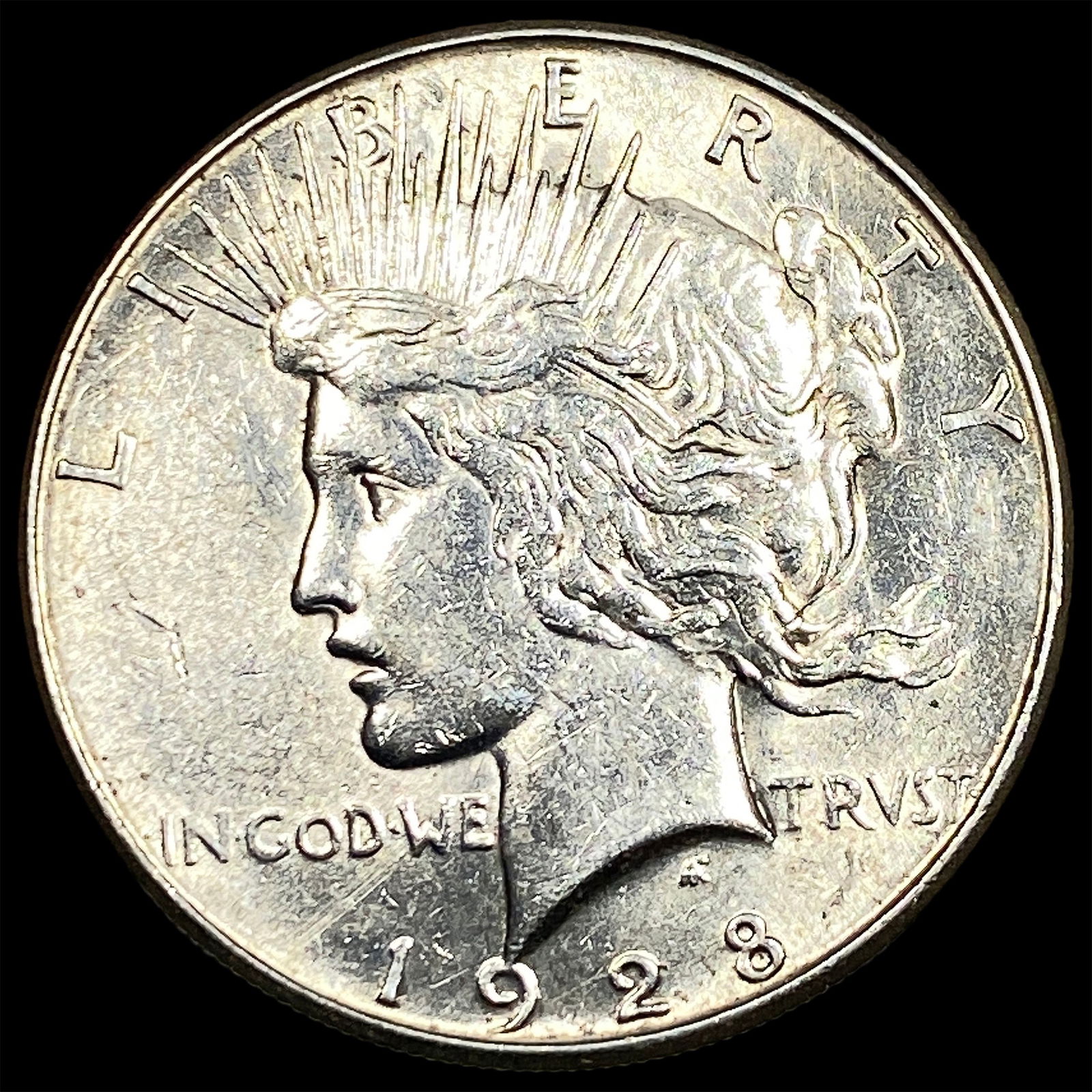 1928 Silver Peace Dollar CLOSELY UNCIRCULATED (1 of 2)