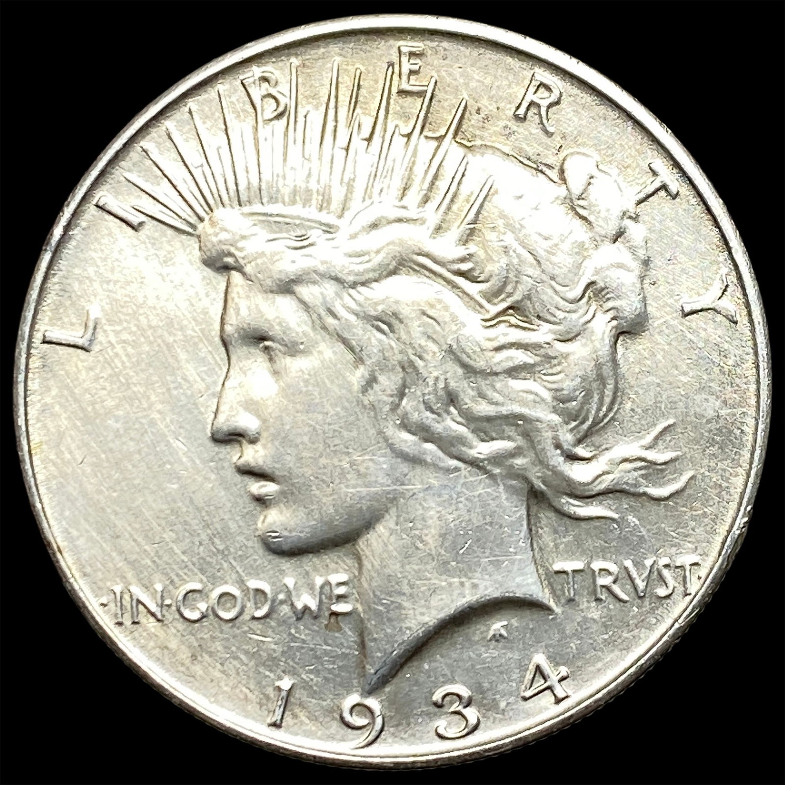 1934 Silver Peace Dollar CLOSELY UNCIRCULATED (1 of 2)