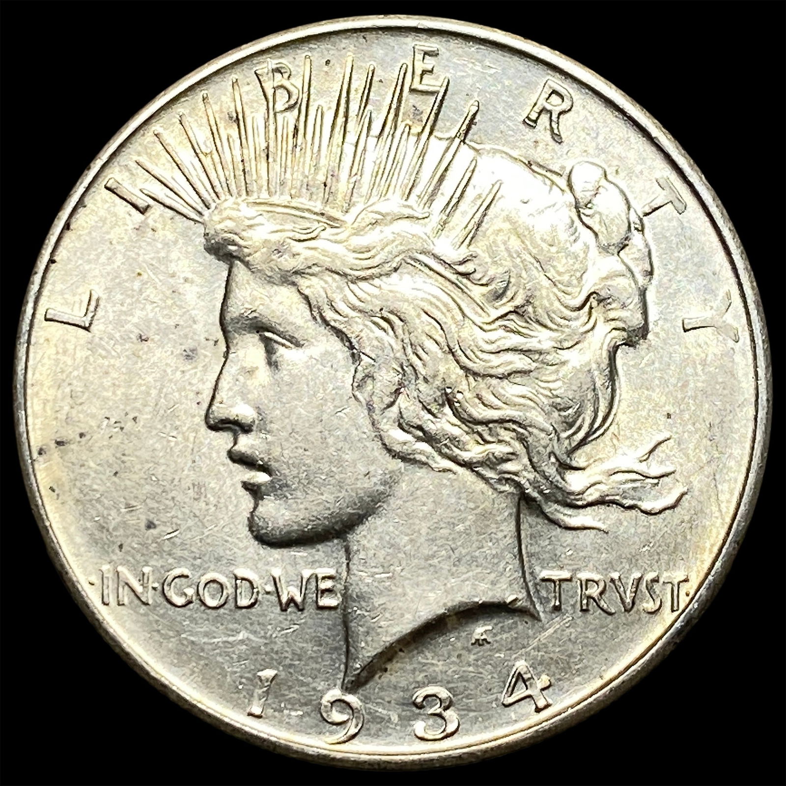 1934 Silver Peace Dollar CLOSELY UNCIRCULATED (1 of 2)