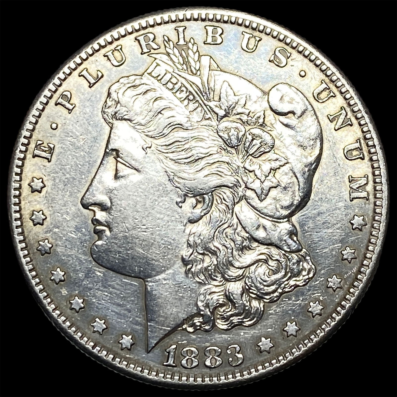 1883-S Silver Morgan Dollar CLOSELY UNCIRCULATED (1 of 2)