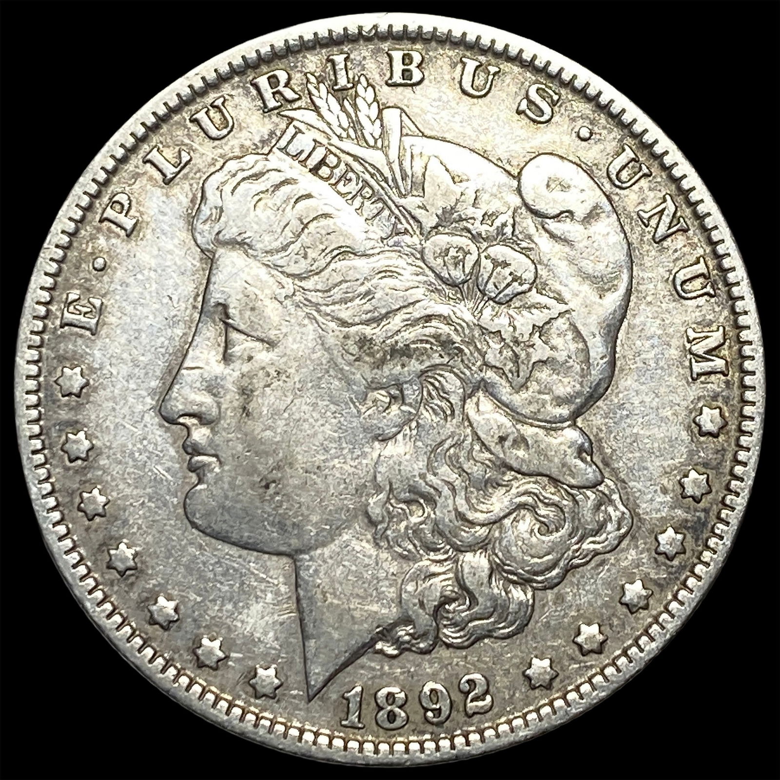 1892-O Silver Morgan Dollar NEARLY UNCIRCULATED (1 of 2)