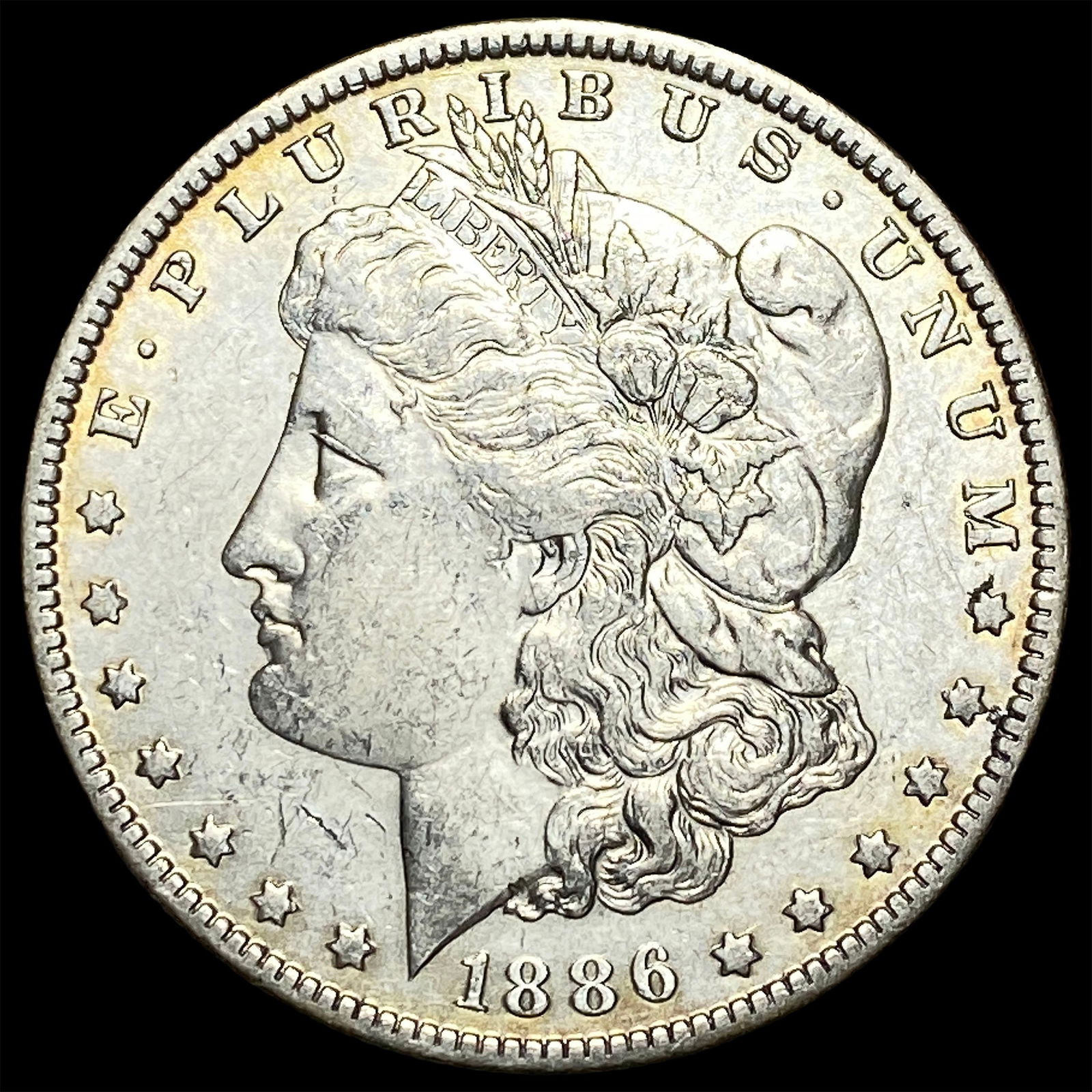 1886-O Silver Morgan Dollar NEARLY UNCIRCULATED (1 of 2)