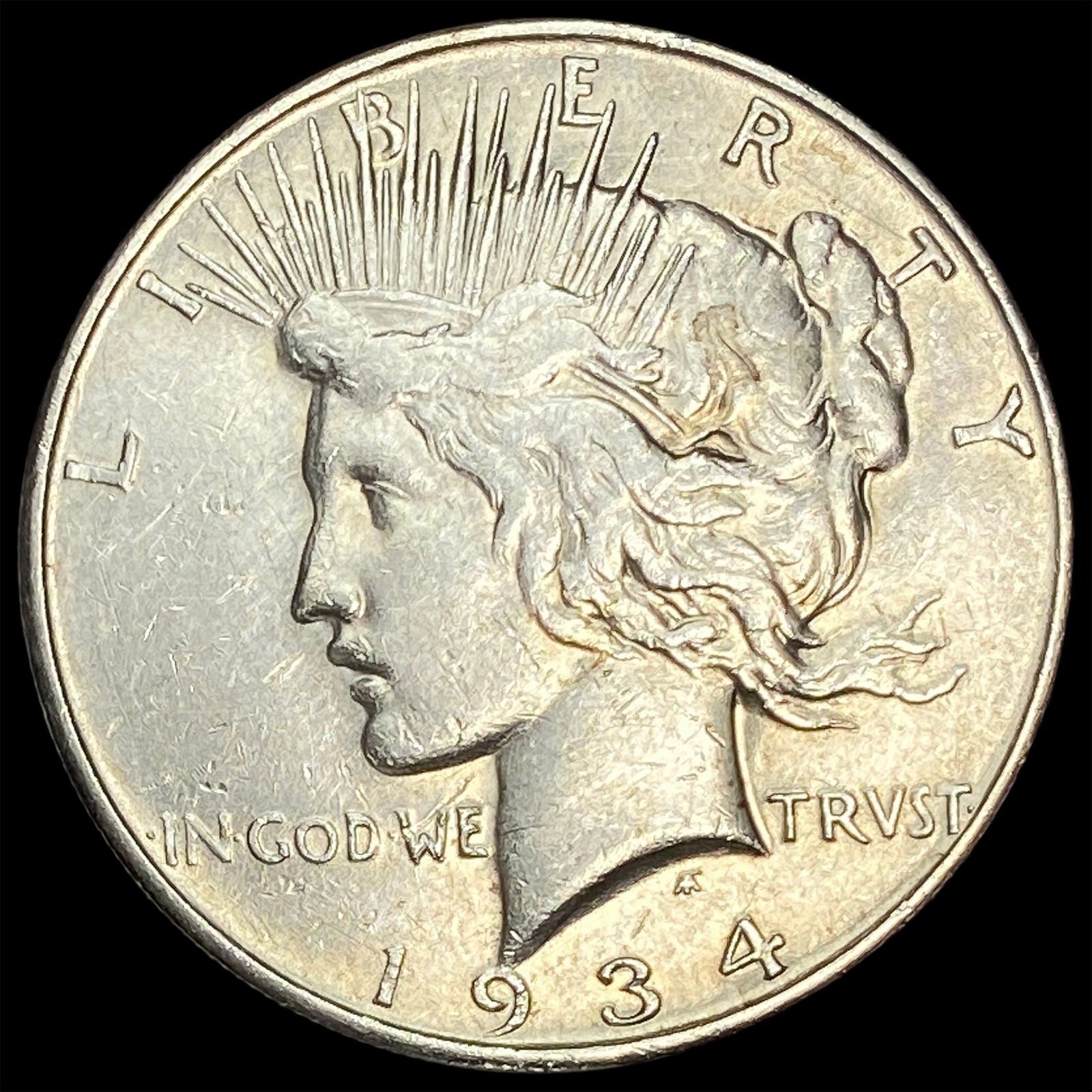 1934 Peace Silver Dollar CLOSELY UNCIRCULATED (1 of 2)