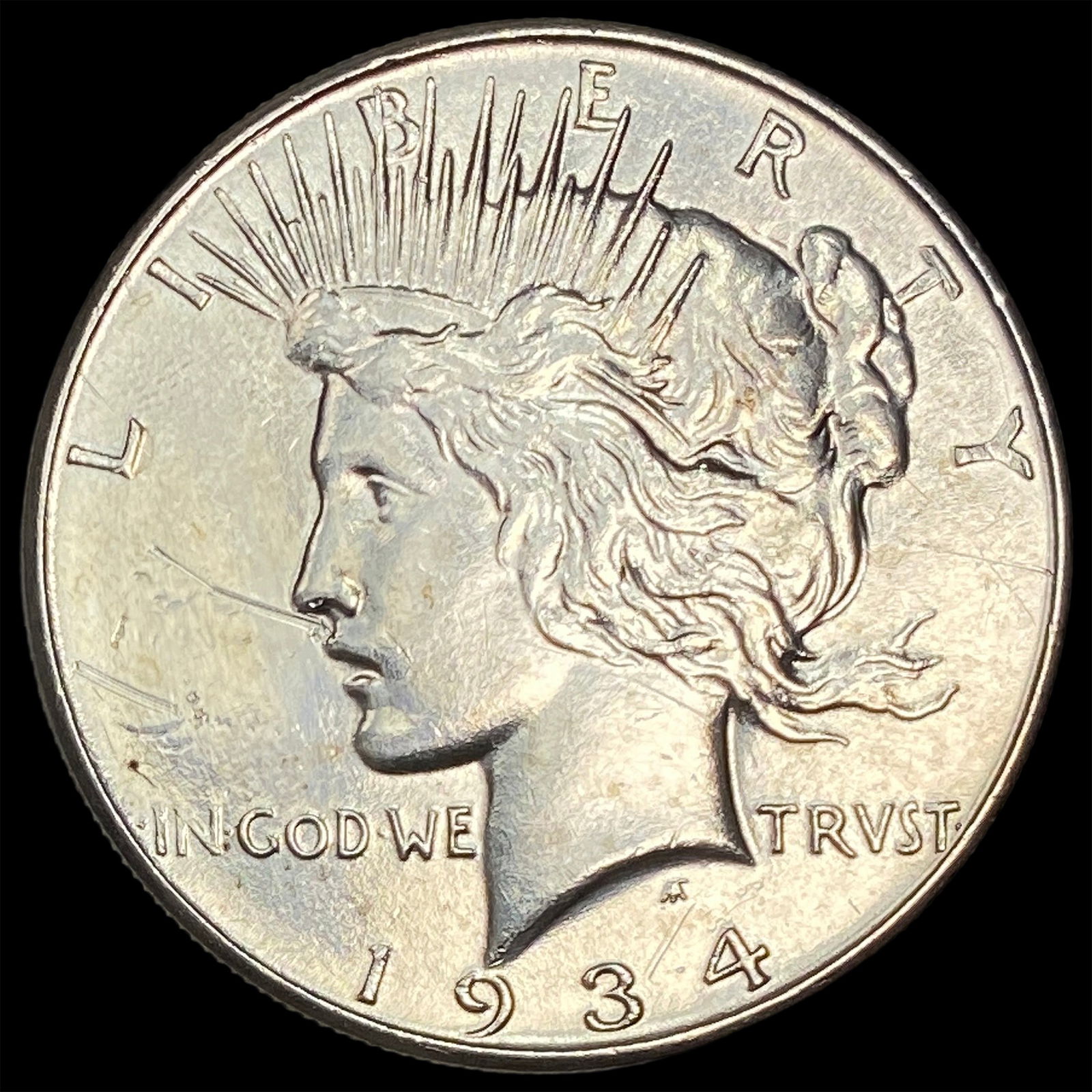 1934 Peace Silver Dollar CLOSELY UNCIRCULATED (1 of 2)