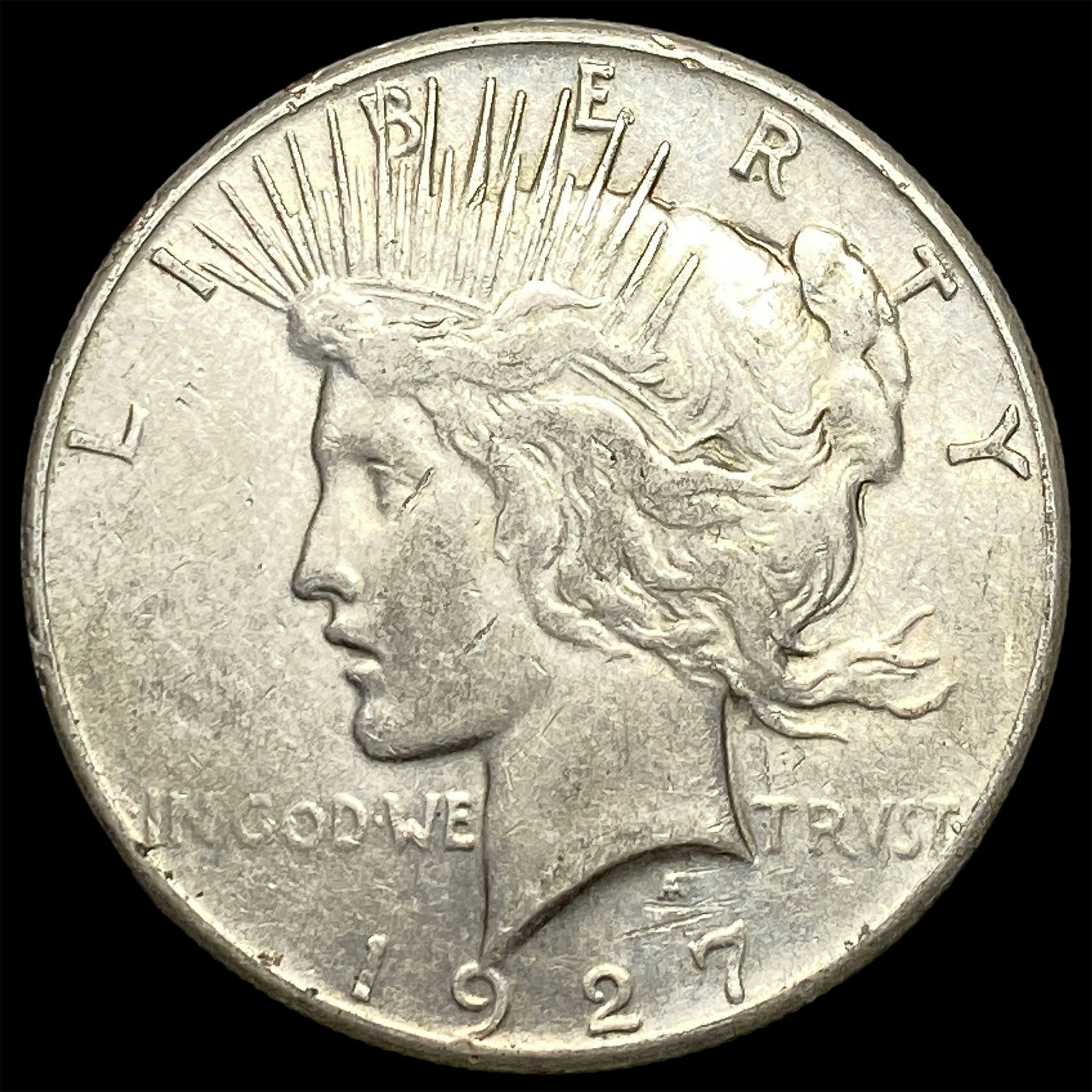1927 Silver Peace Dollar NEARLY UNCIRCULATED (1 of 2)