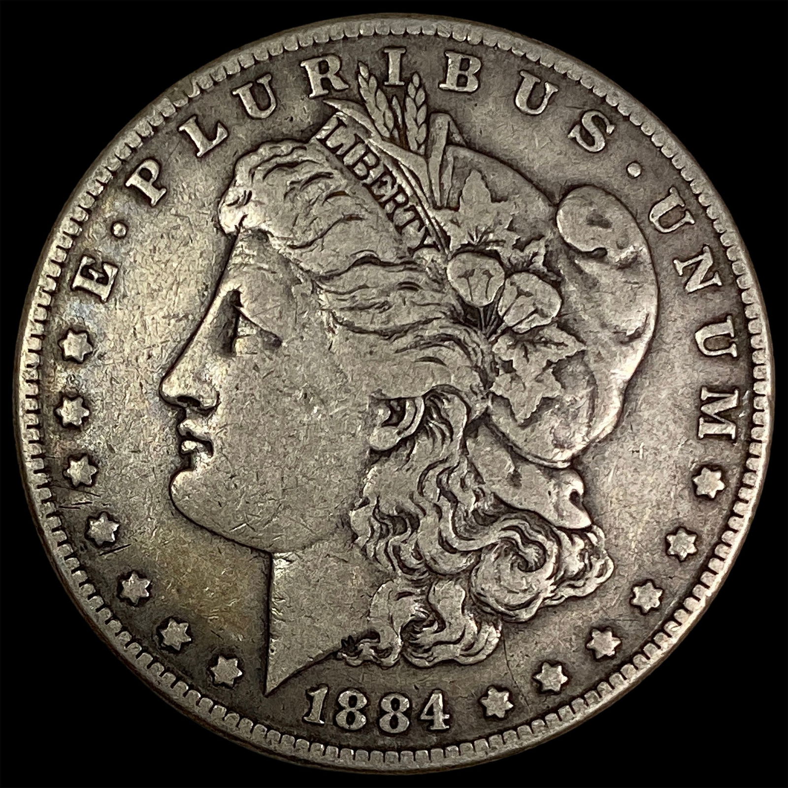 1884 Silver Morgan Dollar ABOUT UNCIRCULATED: 1884 Silver Morgan Dollar ABOUT UNCIRCULATED