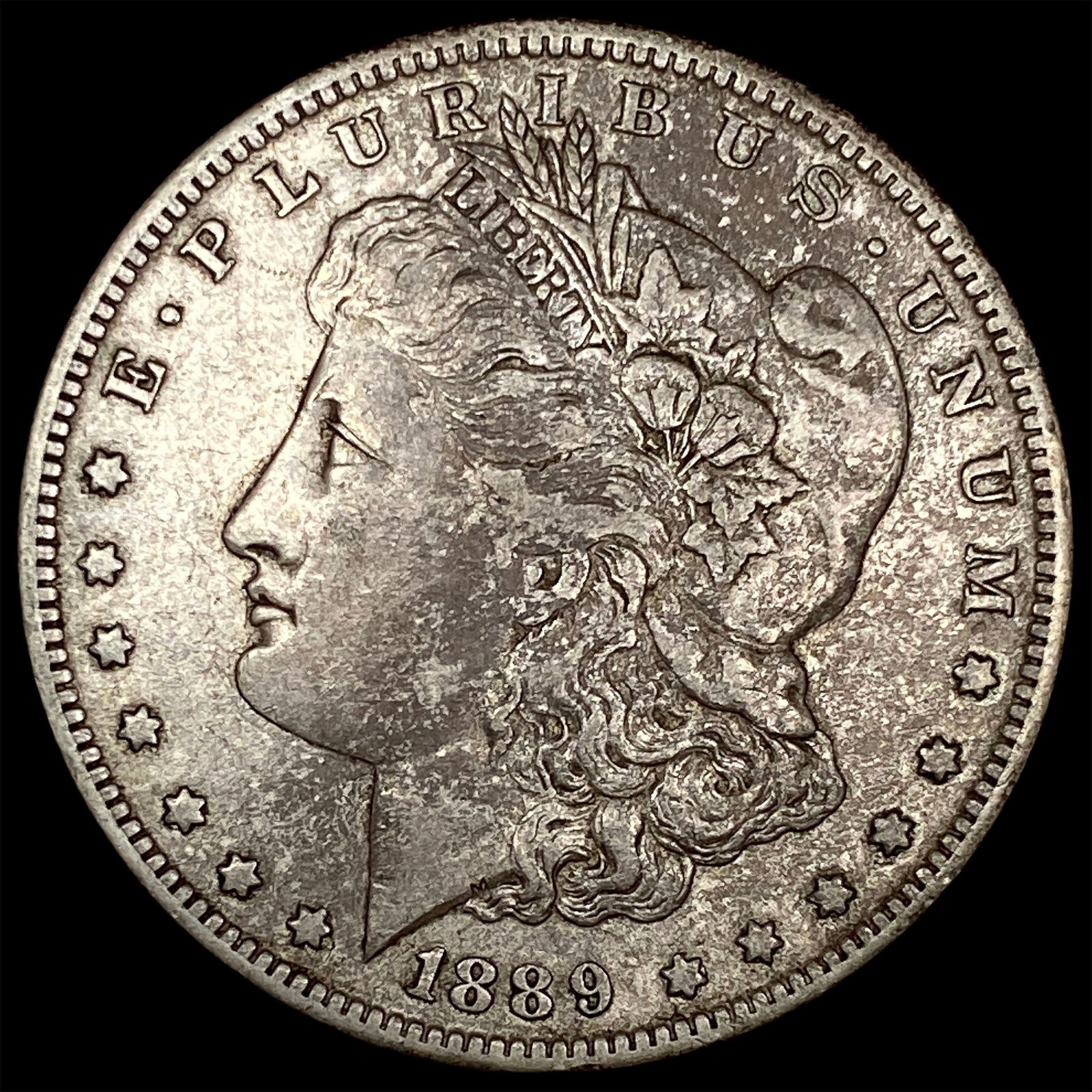 1889-O Silver Morgan Dollar CLOSELY UNCIRCULATED (1 of 2)