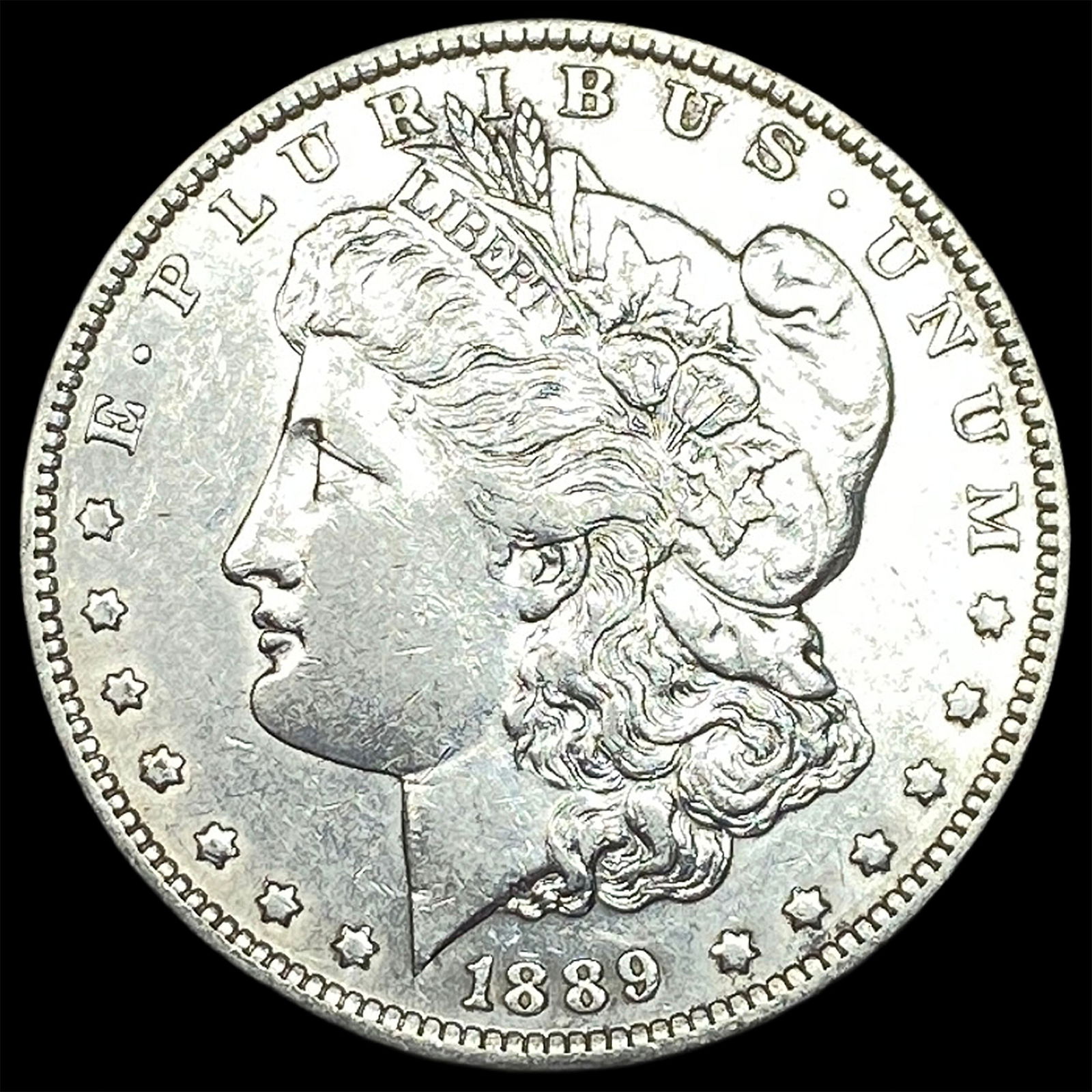 1889 Morgan Silver Dollar CLOSELY UNCIRCULATED (1 of 2)