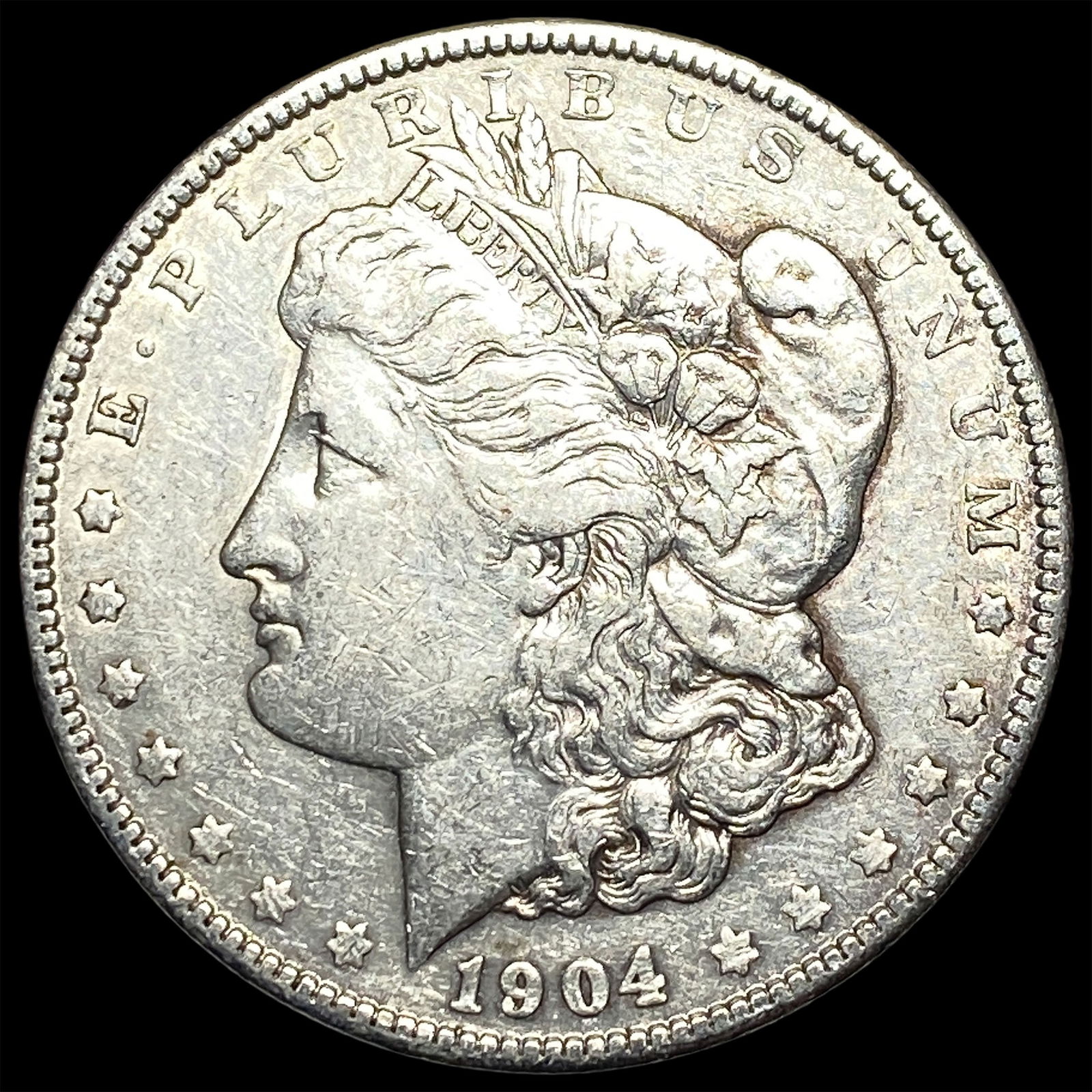 1904-O Silver Morgan Dollar NEARLY UNCIRCULATED (1 of 2)
