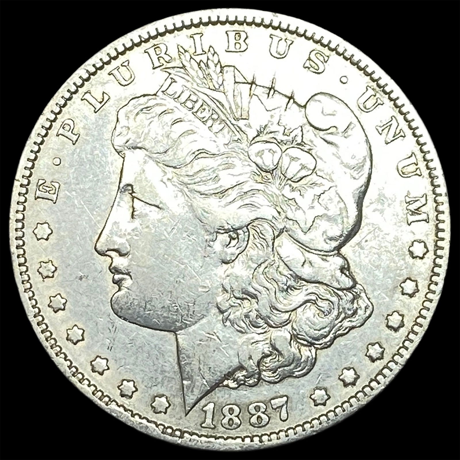 1887-O Silver Morgan Dollar CLOSELY UNCIRCULATED: 1887-O Silver Morgan Dollar CLOSELY UNCIRCULATED