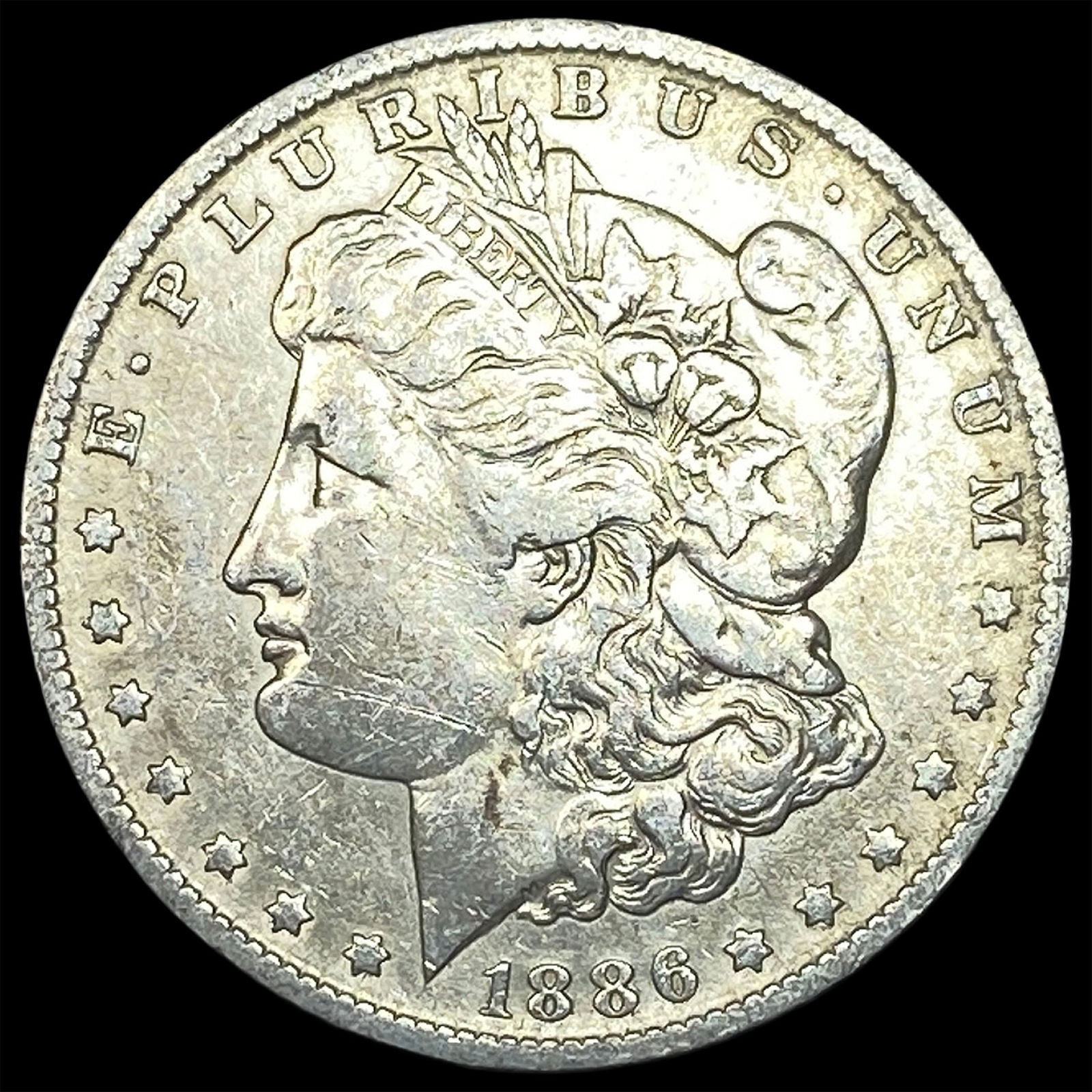 1886-O Silver Morgan Dollar ABOUT UNCIRCULATED: 1886-O Silver Morgan Dollar ABOUT UNCIRCULATED