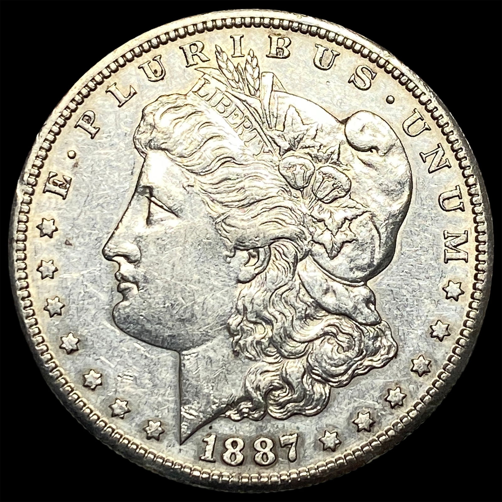 1887 Silver Morgan Dollar CLOSELY UNCIRCULATED: 1887 Silver Morgan Dollar CLOSELY UNCIRCULATED