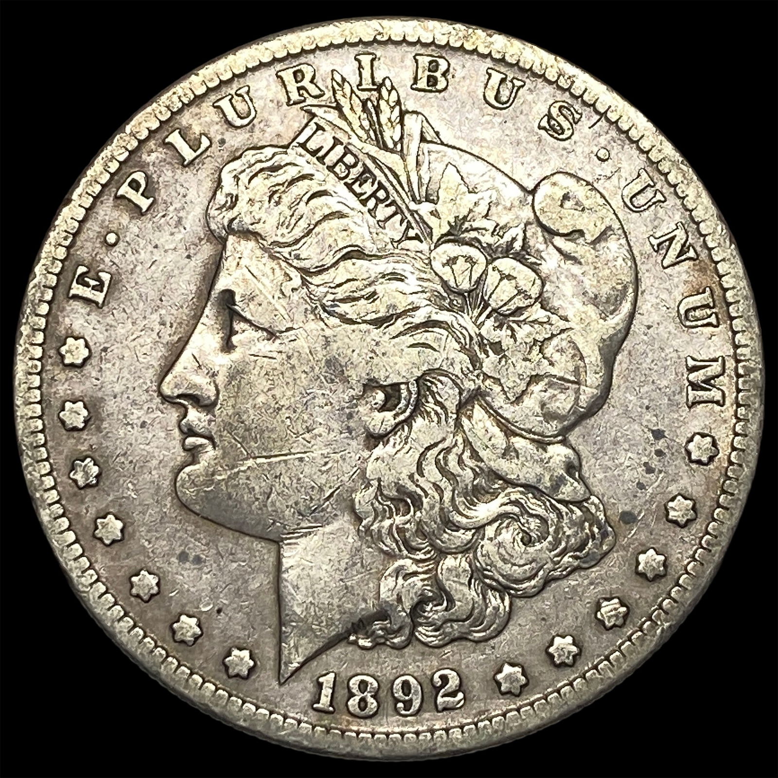 1892-S Silver Morgan Dollar ABOUT UNCIRCULATED: 1892-S Silver Morgan Dollar ABOUT UNCIRCULATED