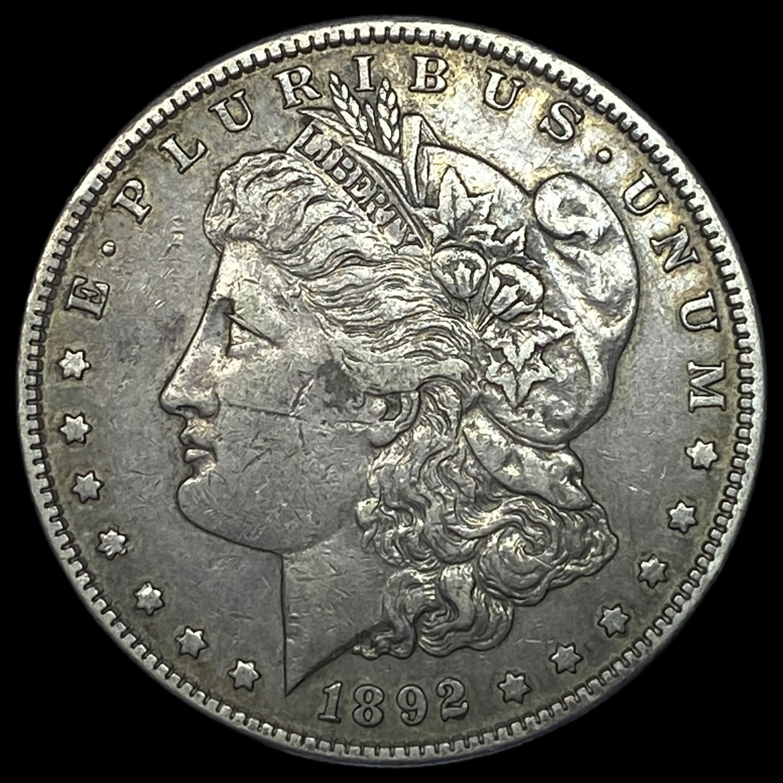 1892-S Silver Morgan Dollar NEARLY UNCIRCULATED (1 of 2)