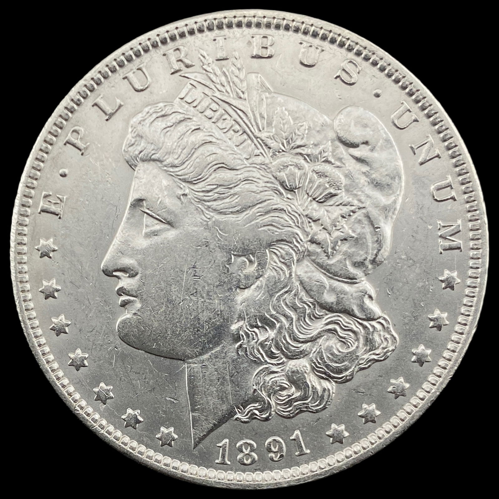 1891-O Silver Morgan Dollar CLOSELY UNCIRCULATED (1 of 2)