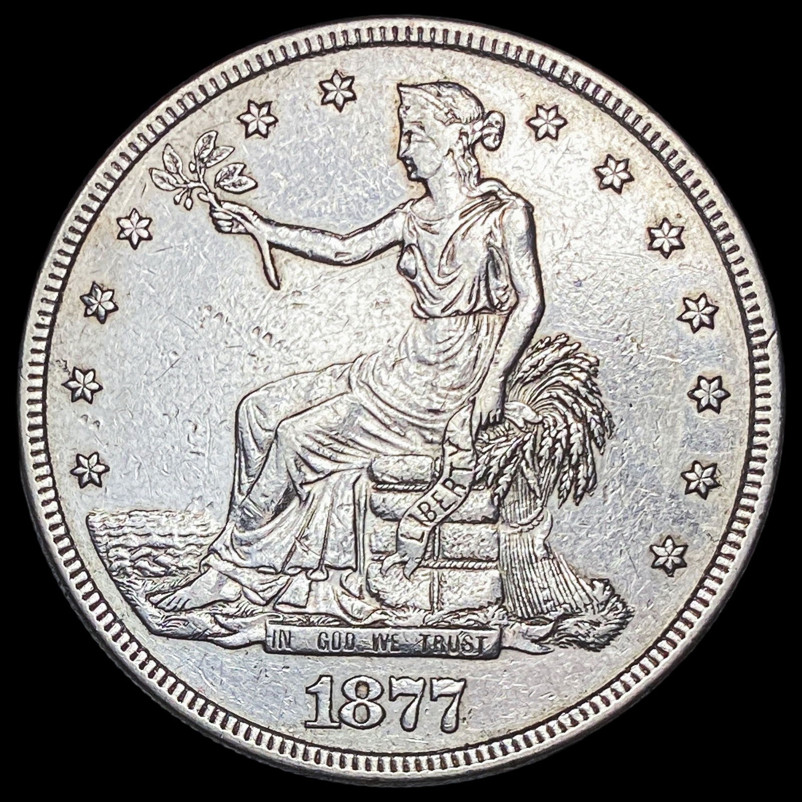 1877 Silver Trade Dollar CLOSELY UNCIRCULATED (1 of 2)