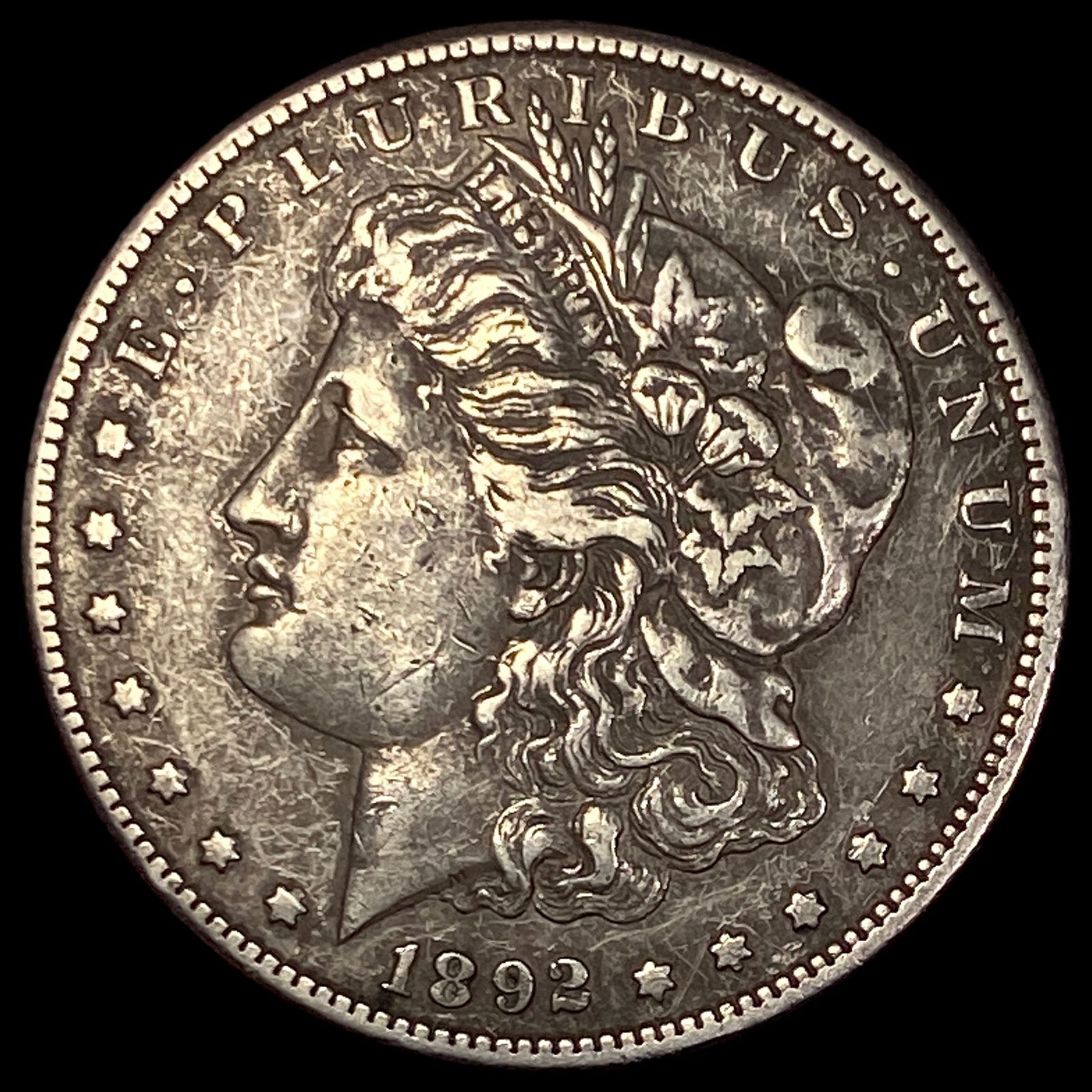 1892-S Silver Morgan Dollar NEARLY UNCIRCULATED (1 of 2)