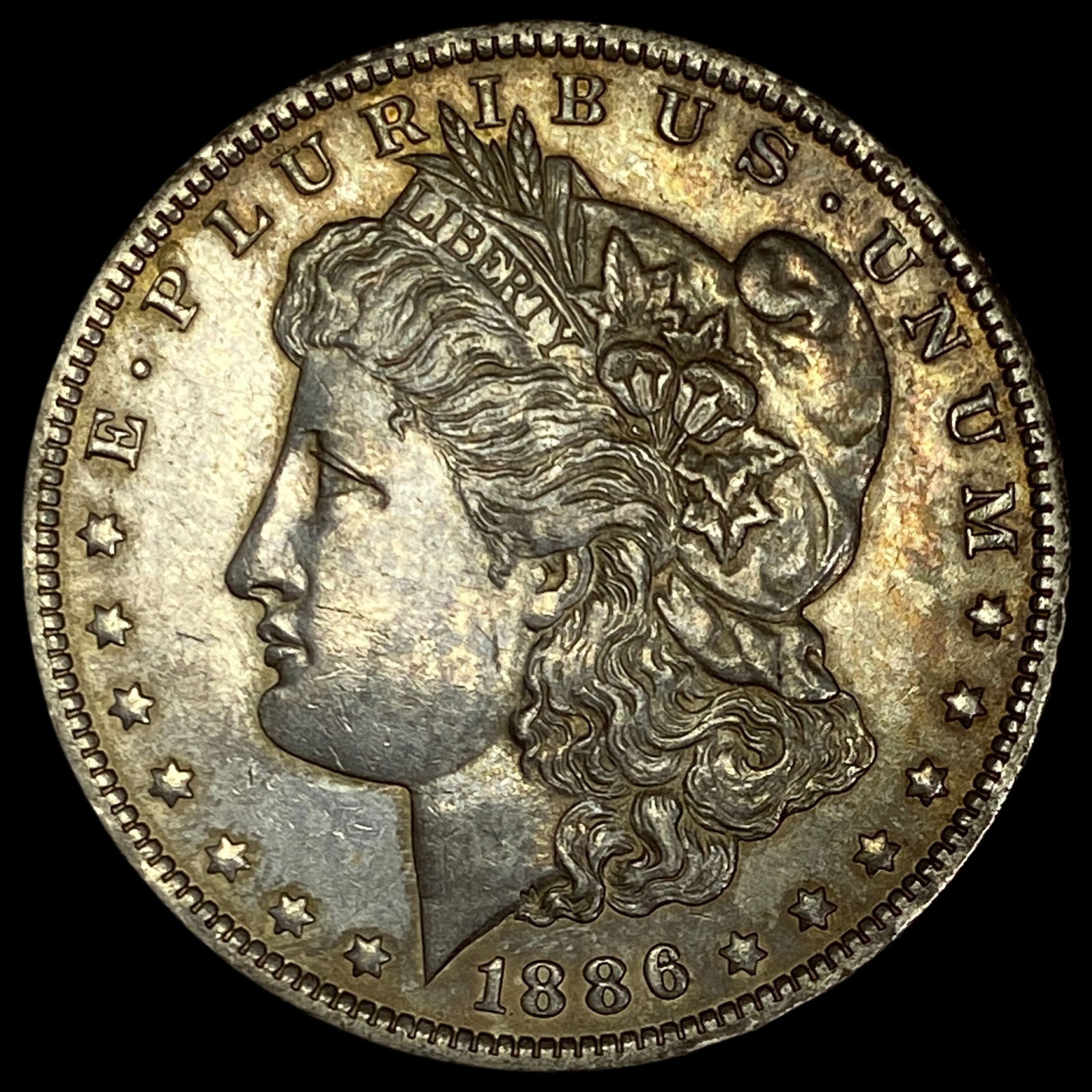 1886 Morgan Silver Dollar CLOSELY UNCIRCULATED (1 of 2)