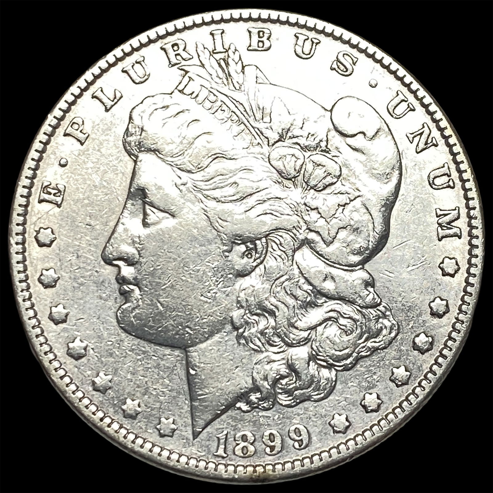 1899 Morgan Silver Dollar CLOSELY UNCIRCULATED (1 of 2)