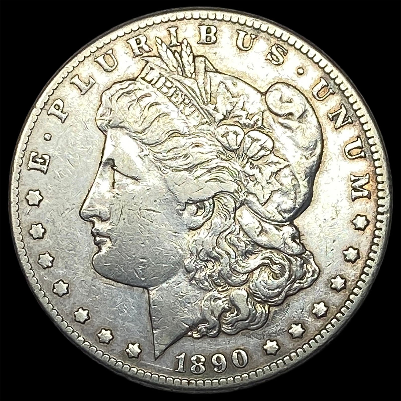 1890-CC Silver Morgan Dollar ABOUT UNCIRCULATED: 1890-CC Silver Morgan Dollar ABOUT UNCIRCULATED