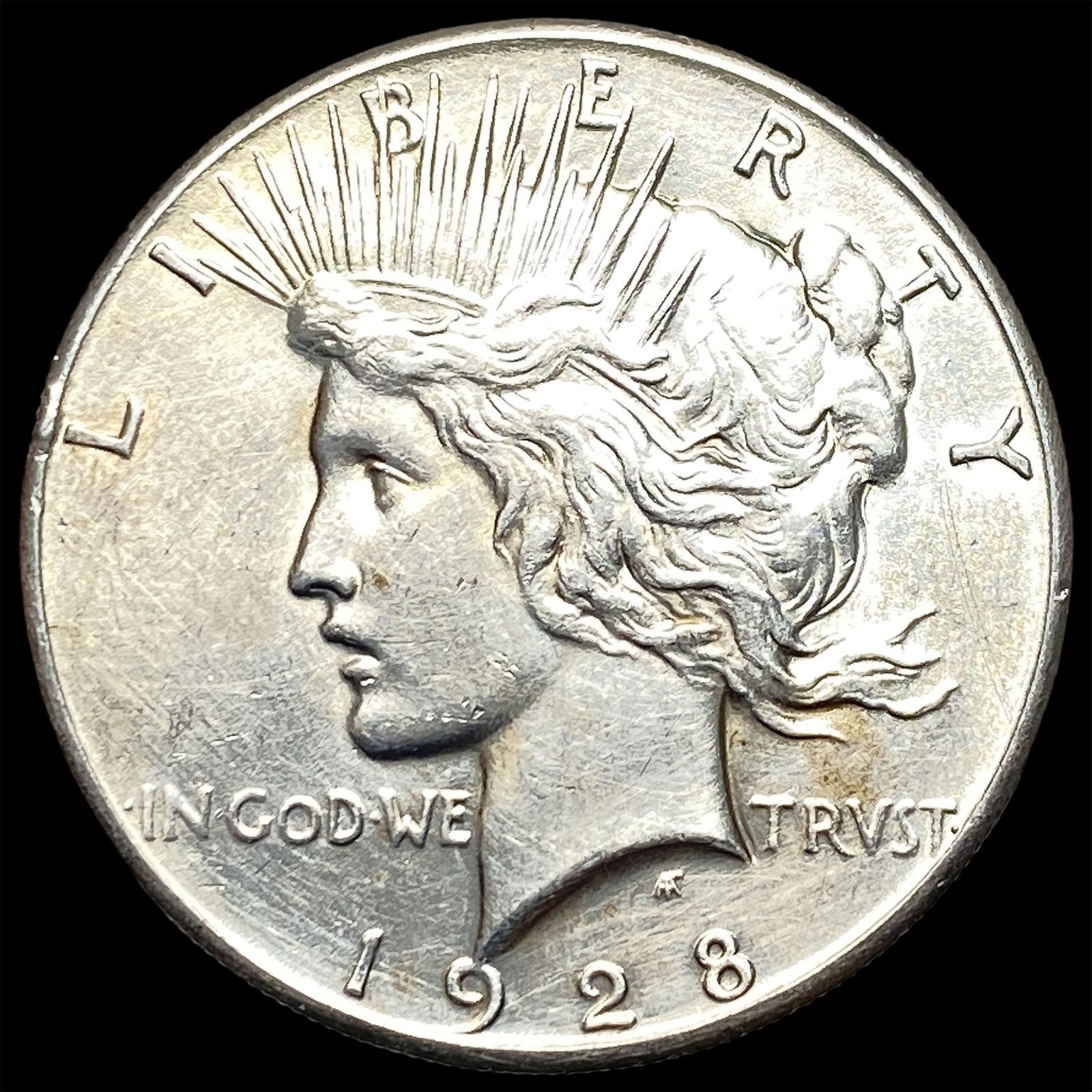 1928 Silver Peace Dollar CLOSELY UNCIRCULATED (1 of 2)