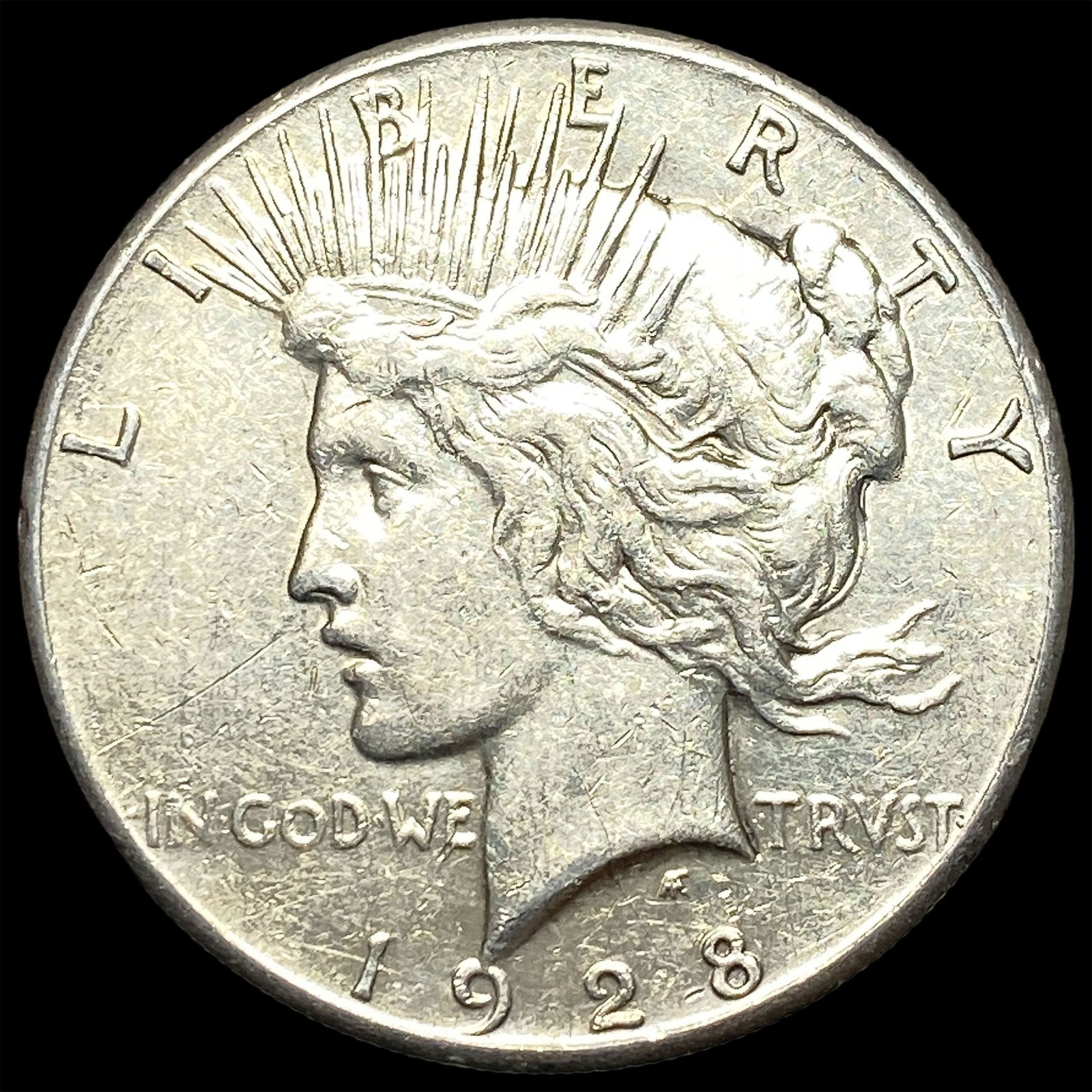 1928 Silver Peace Dollar CLOSELY UNCIRCULATED (1 of 2)