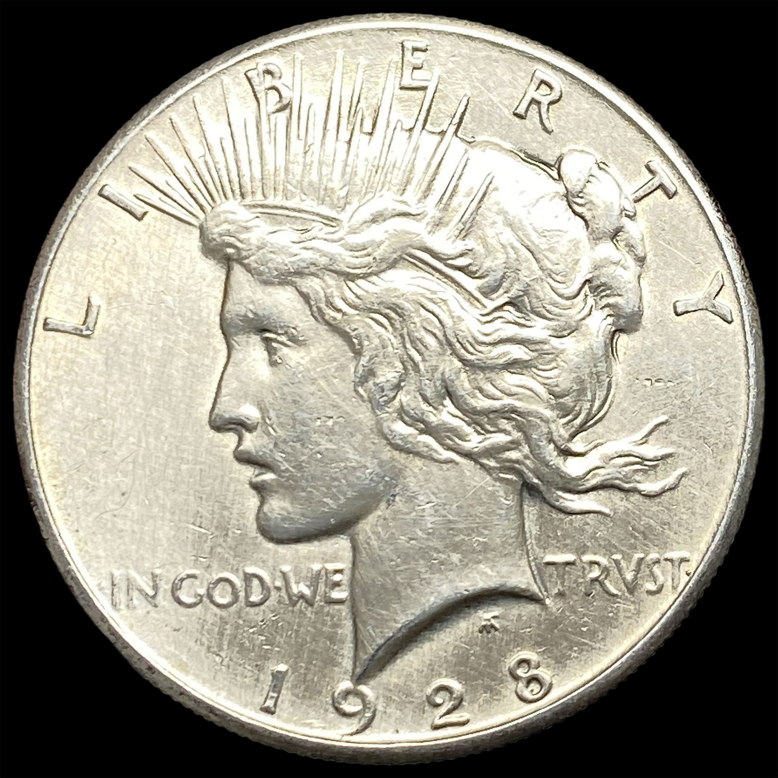 1928 Silver Peace Dollar CLOSELY UNCIRCULATED (1 of 2)
