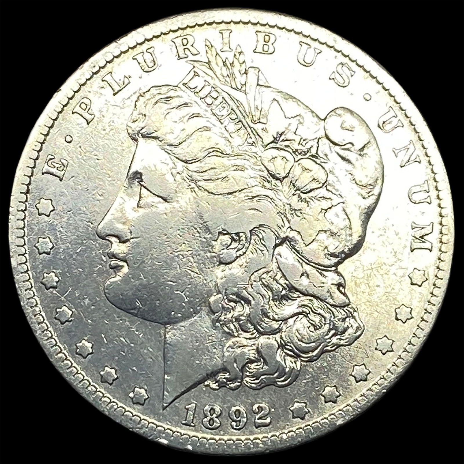 1892-S Silver Morgan Dollar NEARLY UNCIRCULATED (1 of 2)