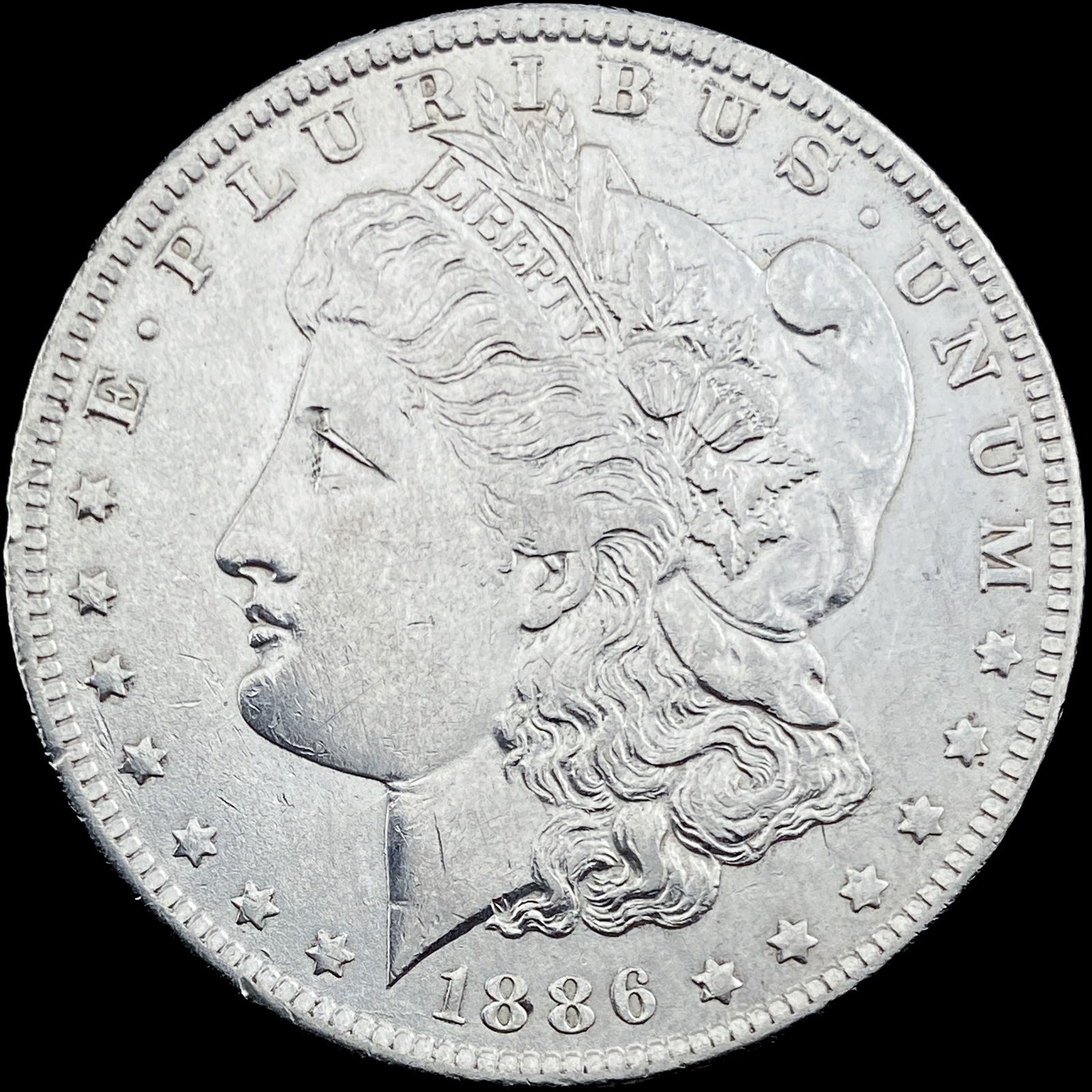 1886-O Silver Morgan Dollar CHOICE AU: 1886-O Silver Morgan Dollar CHOICE AU